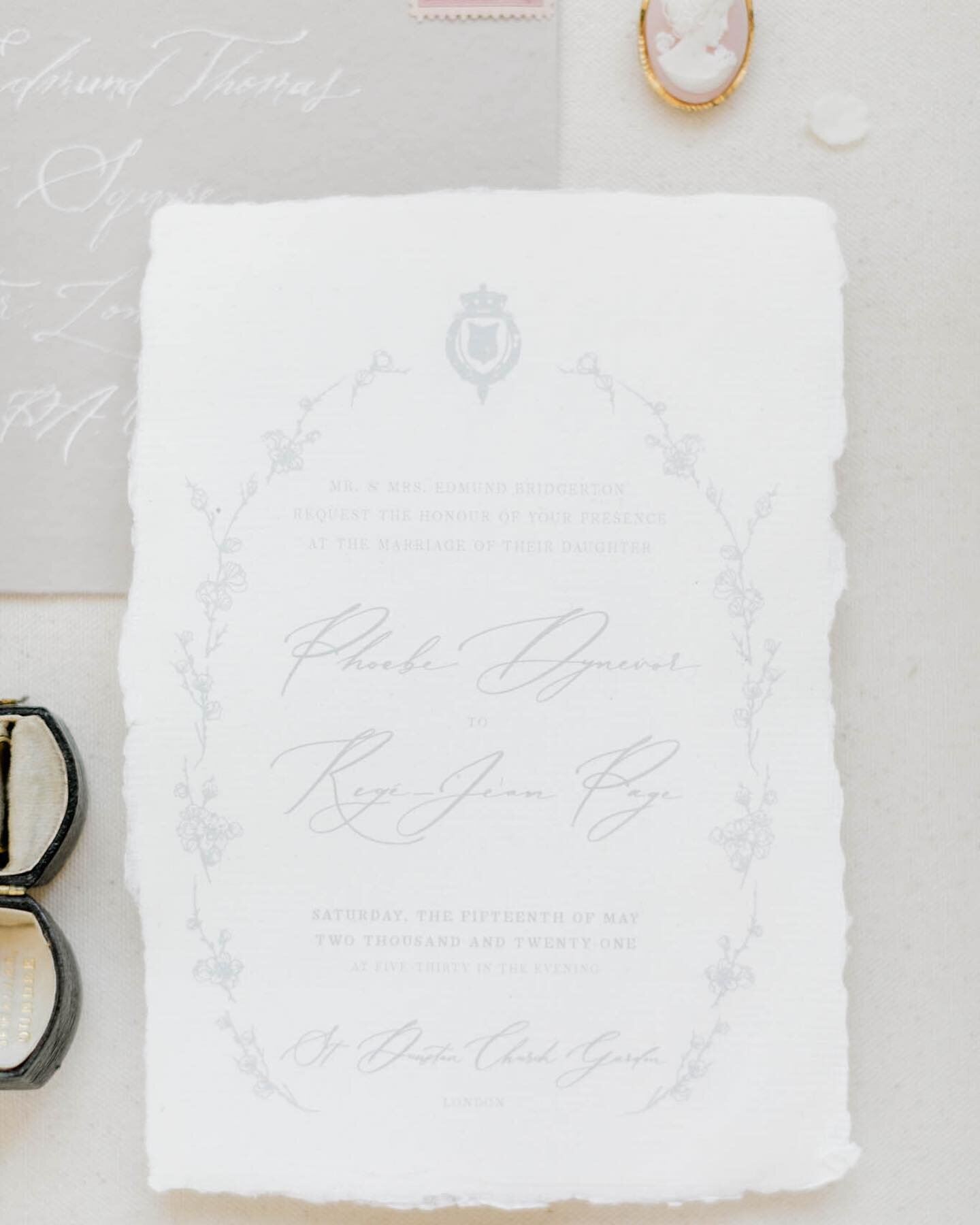 This main Invitation features a custom illustrated Almond Blossom wreath, a unique crest, and Bespoke calligraphy for the couple&rsquo;s names 🤍  How delicate is this soft grey ink on handmade paper! ✨
⁣
Featured on @magnoliarouge⁣, the stunning New