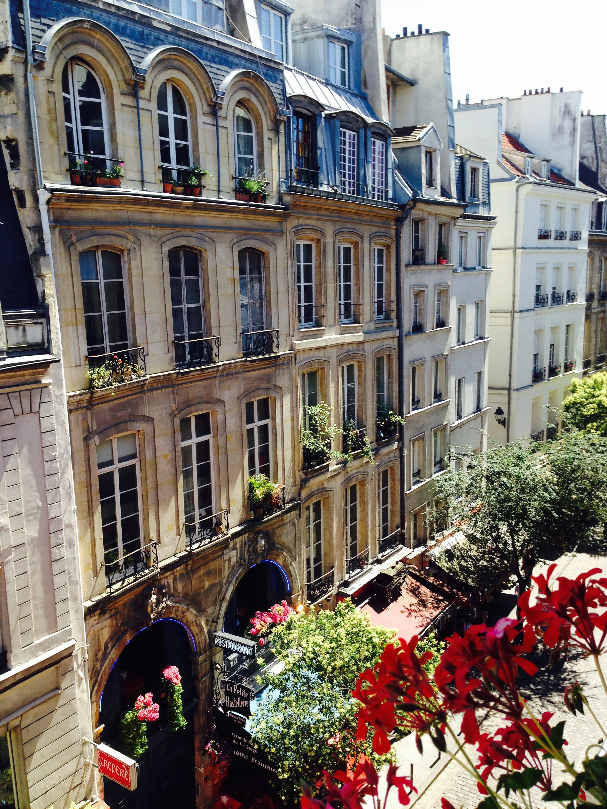 Parisian buildings and cafés in the Latin Quarter near Hotel du Levant.