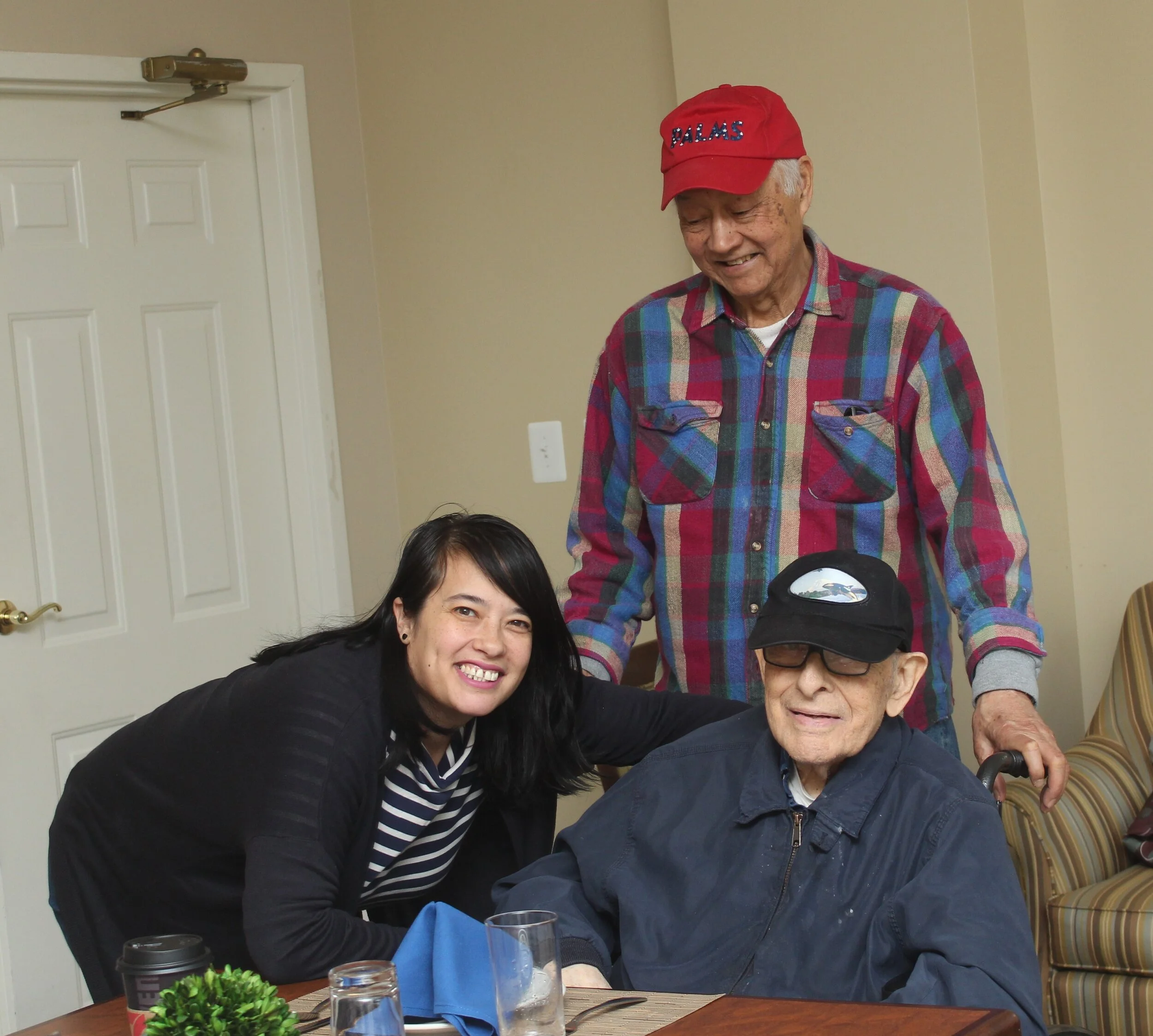 Kim, Bob and Poppi pose for a photo at his pizza party on January 12, 2020