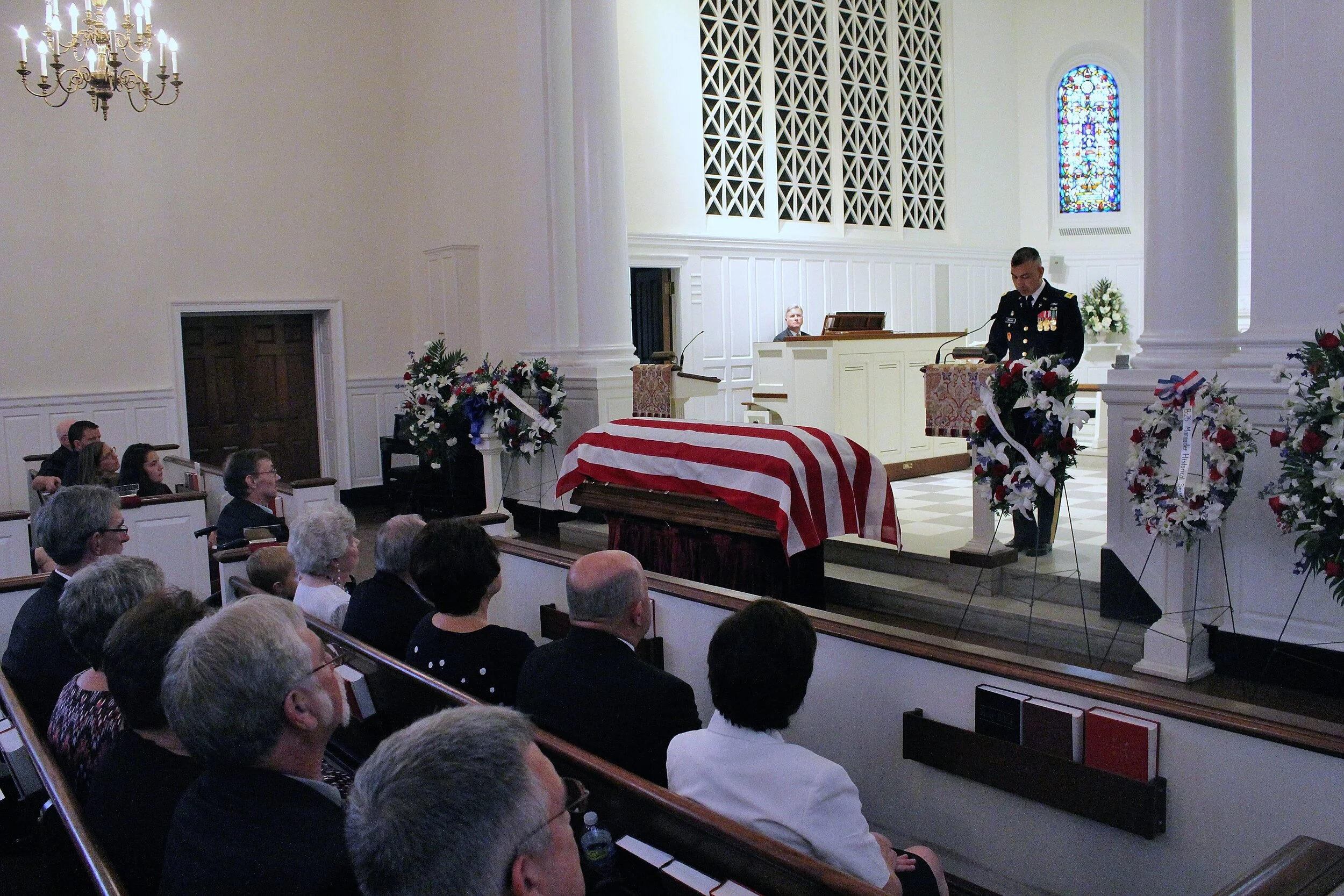 inside old chapel service for b-26 vet