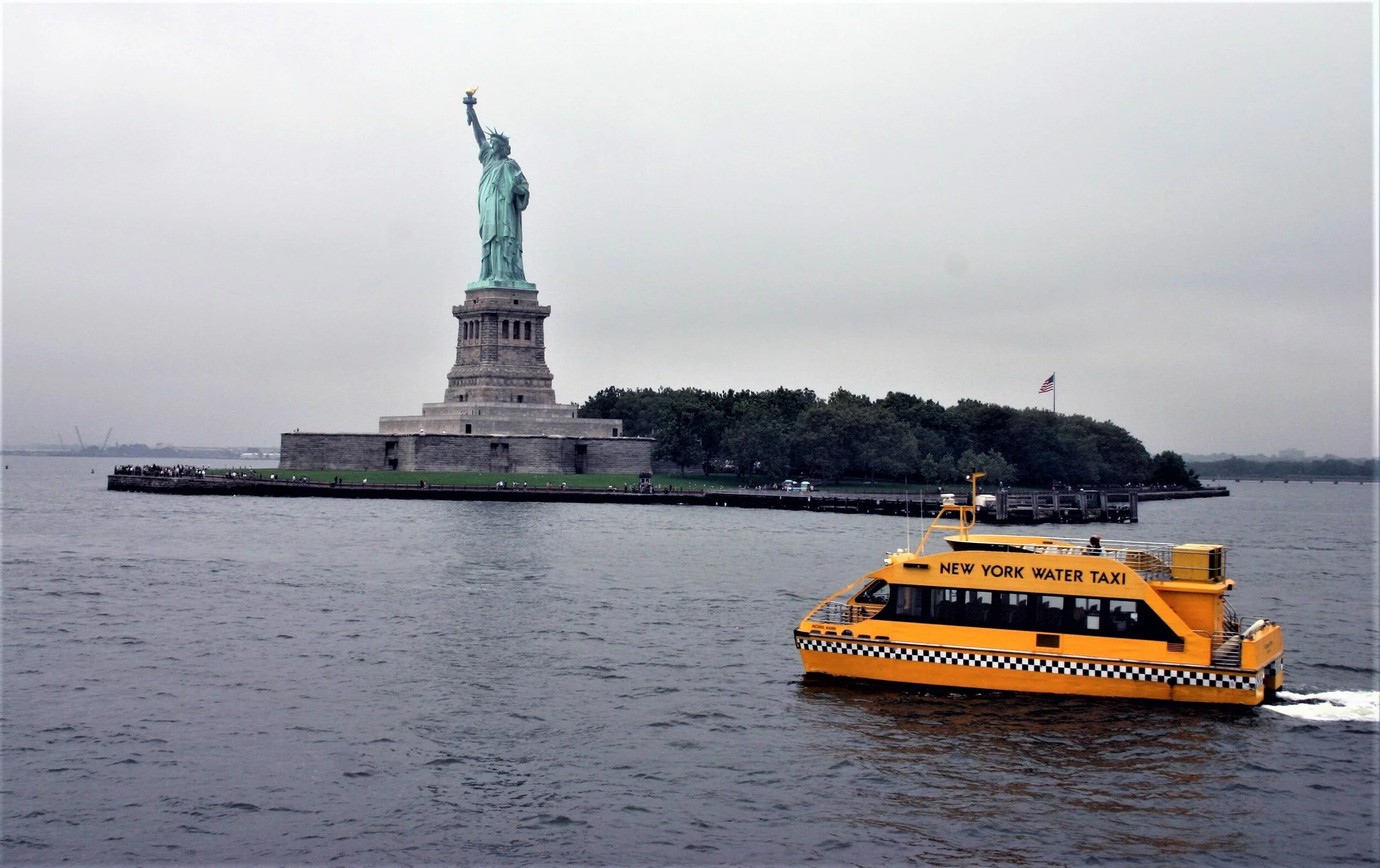 water taxi and Statue of Liberty