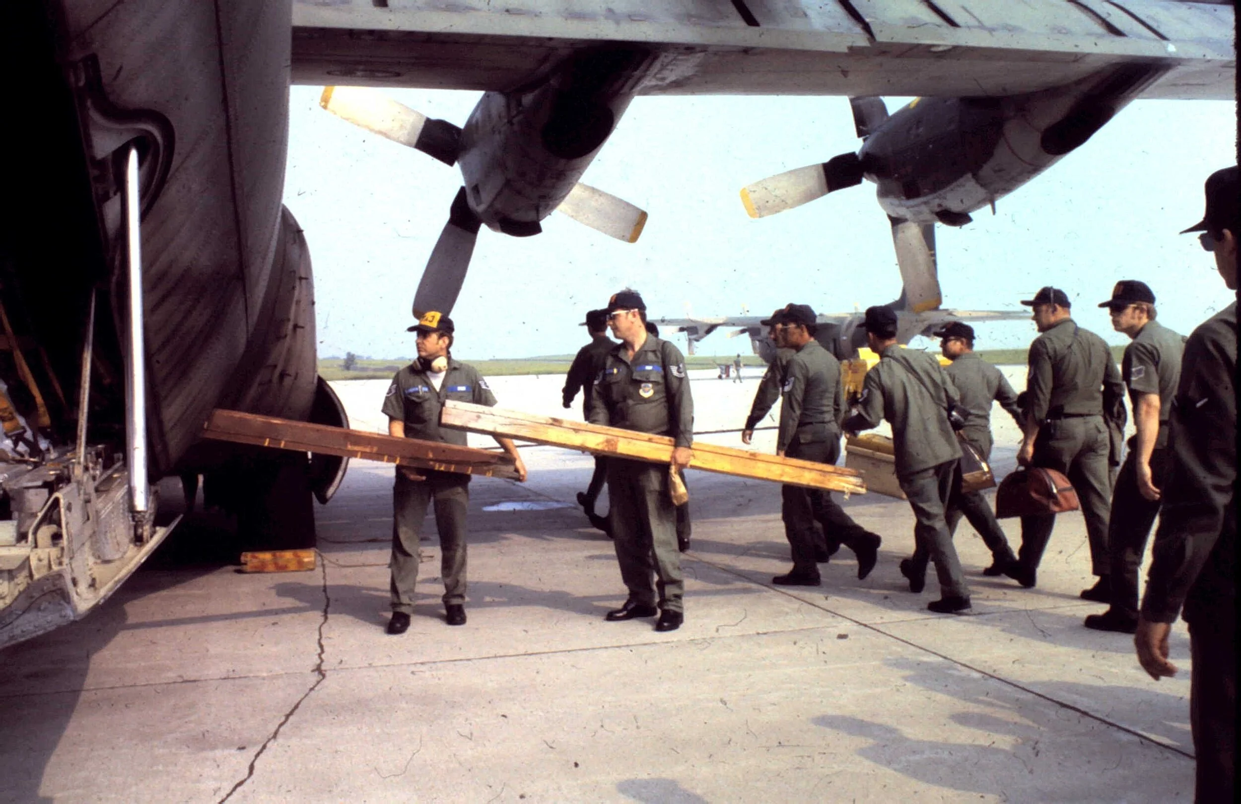 loading wood c-130