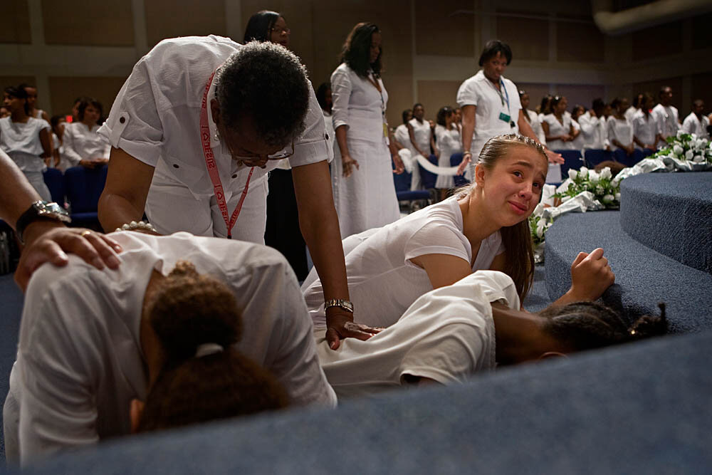  Torrie Wilson, 13, cries at the altar during the Purity Ring Ceremony at the Destiny World Church June 16 in Austell, GA. Young children, teenagers and their parents or guardians came together for three days to promote abstinence. Issues like STDs, 