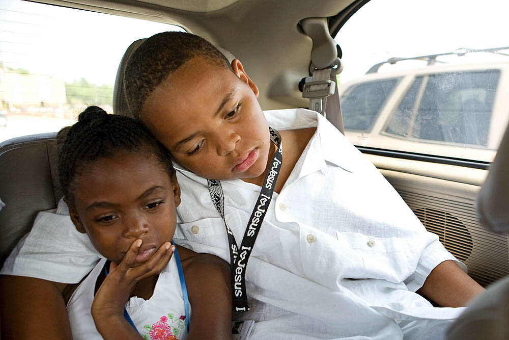  Kennae Tisdale (left) and Julian Tisdale head to the Purity Ring Ceremony June 16 in Lithia Springs, GA. Young children, teenagers and their parents or guardians came together for three days to promote abstinence. Issues like STDs, peer pressure, te