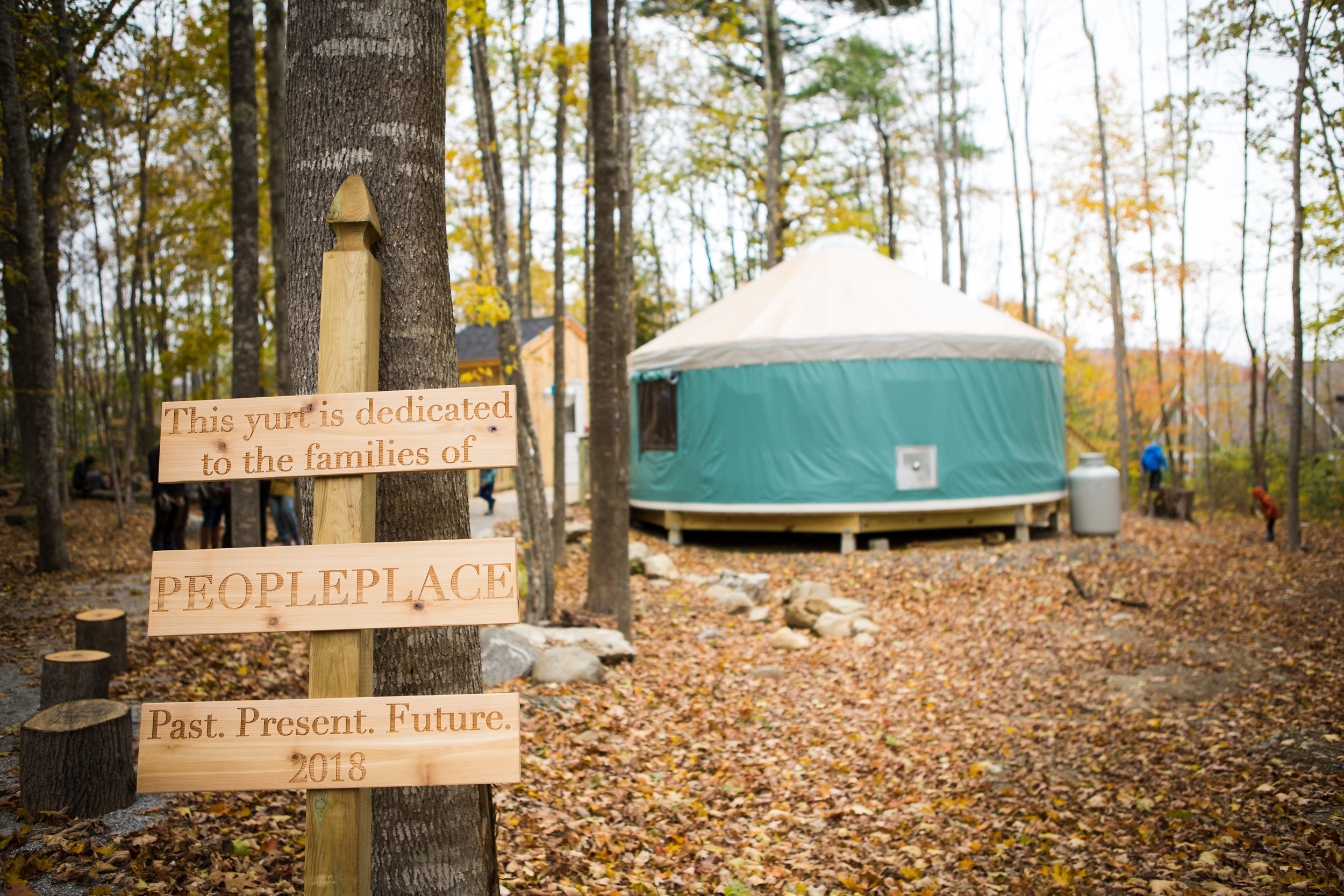 Yurt with sign in foreground.jpg