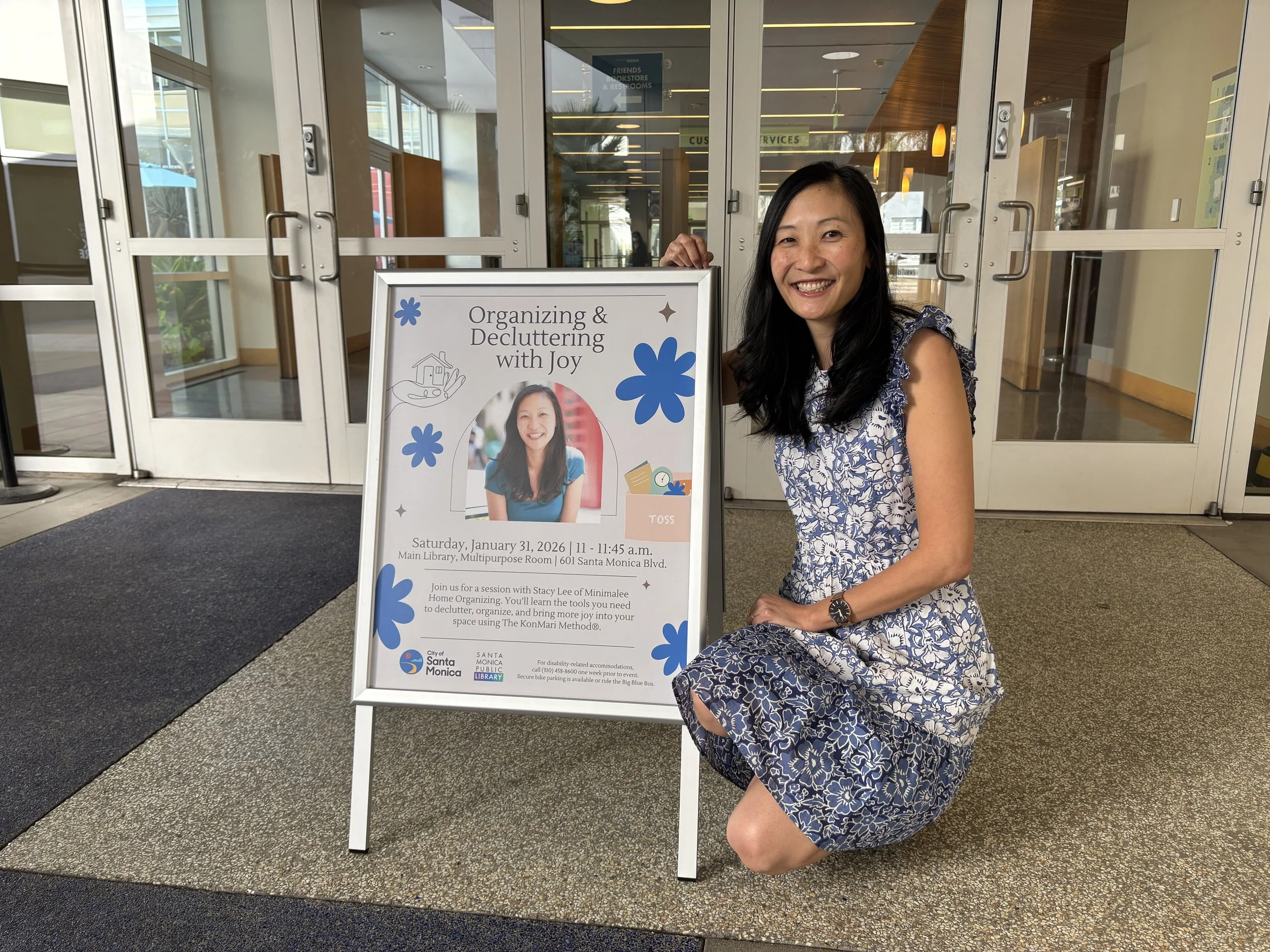 Professional Organizer Stacy Lee next to her Santa Monica Library presenter sign.