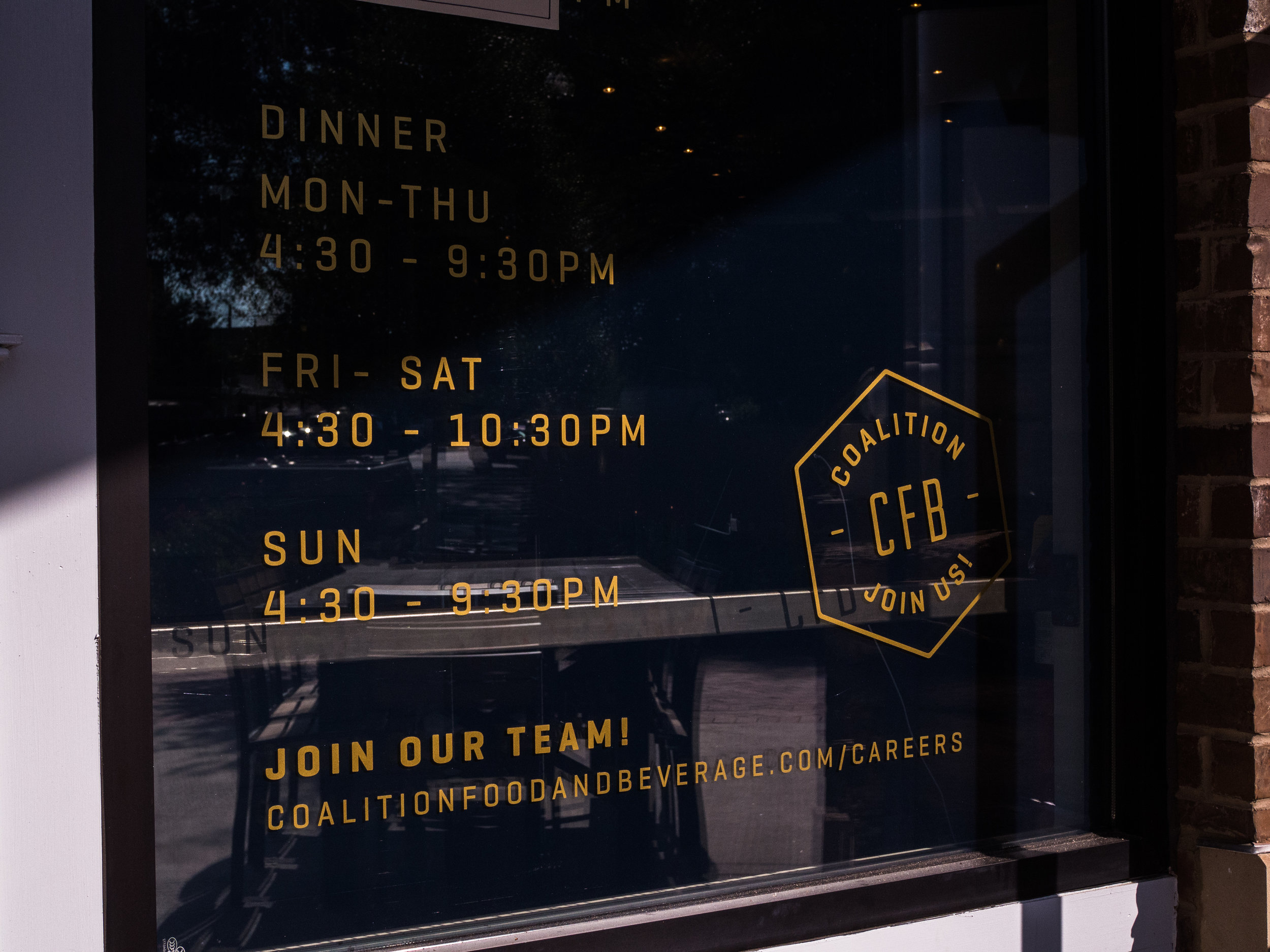 Coalition Food and Beverage Exterior Window with Hours