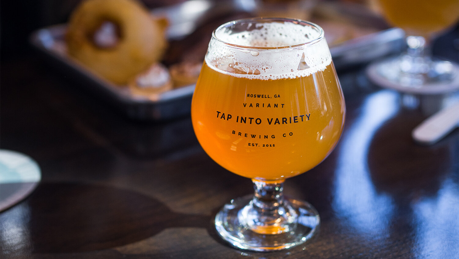 Variant Brewing branded beer glass closeup