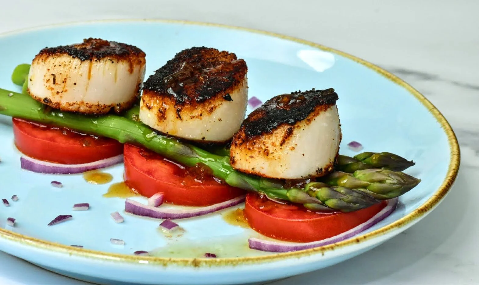 Blackened Scallops, Asparagus, and Tomato with White Balsamic Reduction