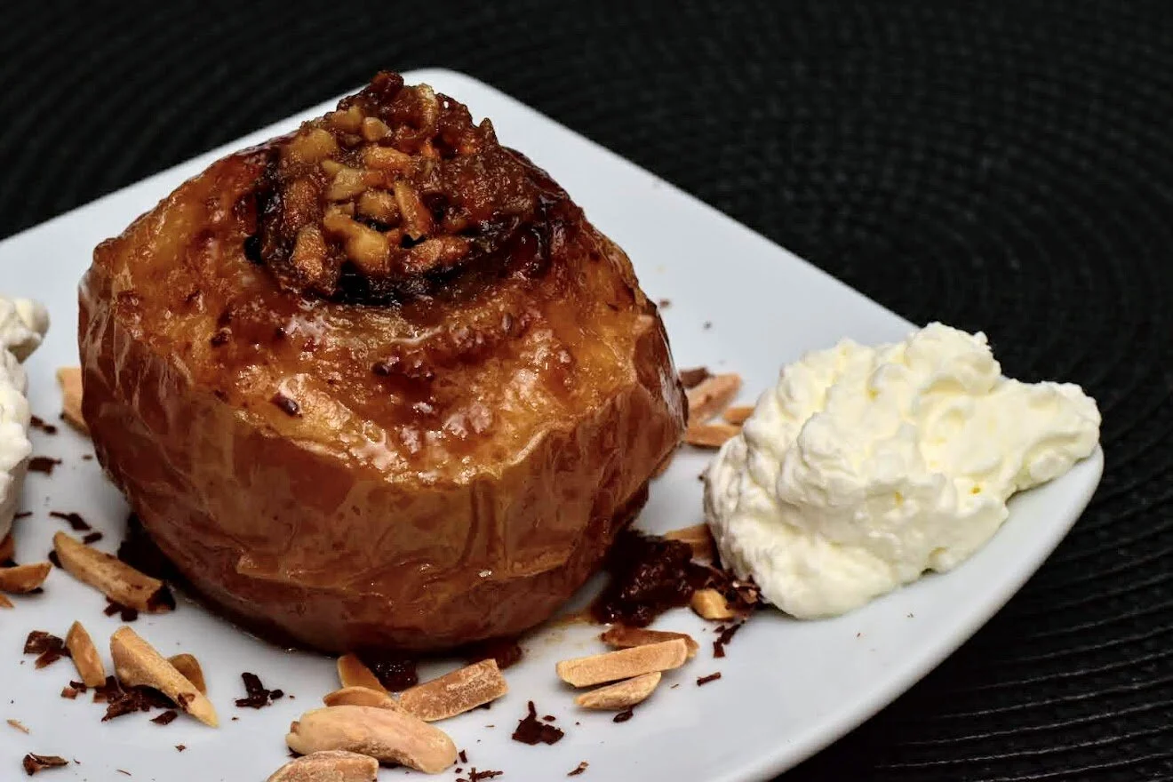 Caramelized Baked Apples with Almonds Dates and Bourbon