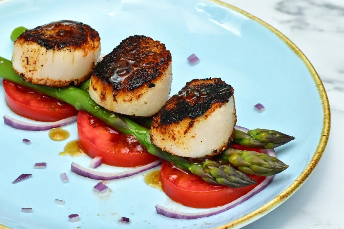 Blackened Scallops with Asparagus, Tomato, and White Balsamic Reduction