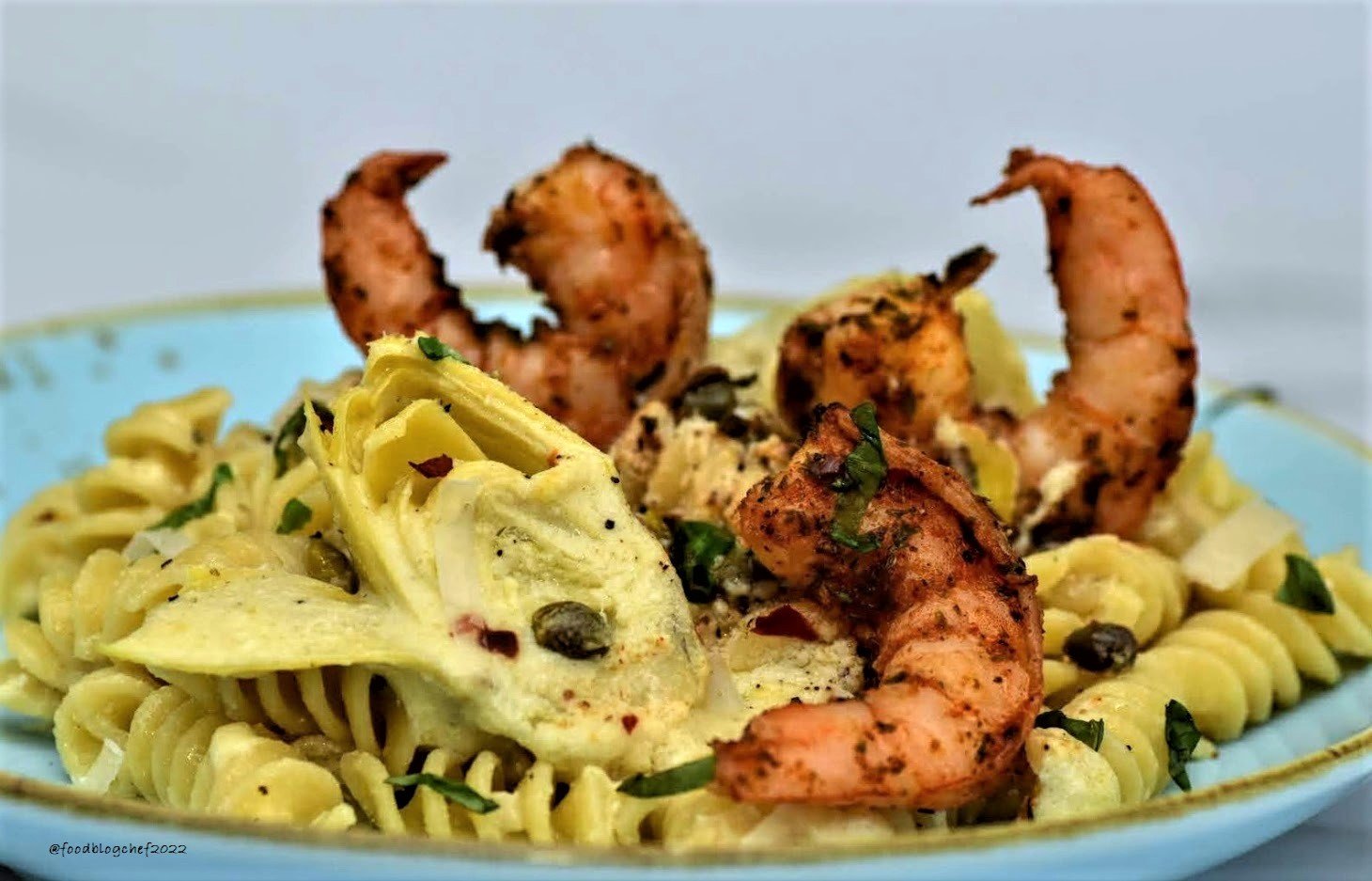 Creamy Artichoke, Lemon, and Capers Pasta with Spicy Shrimp
