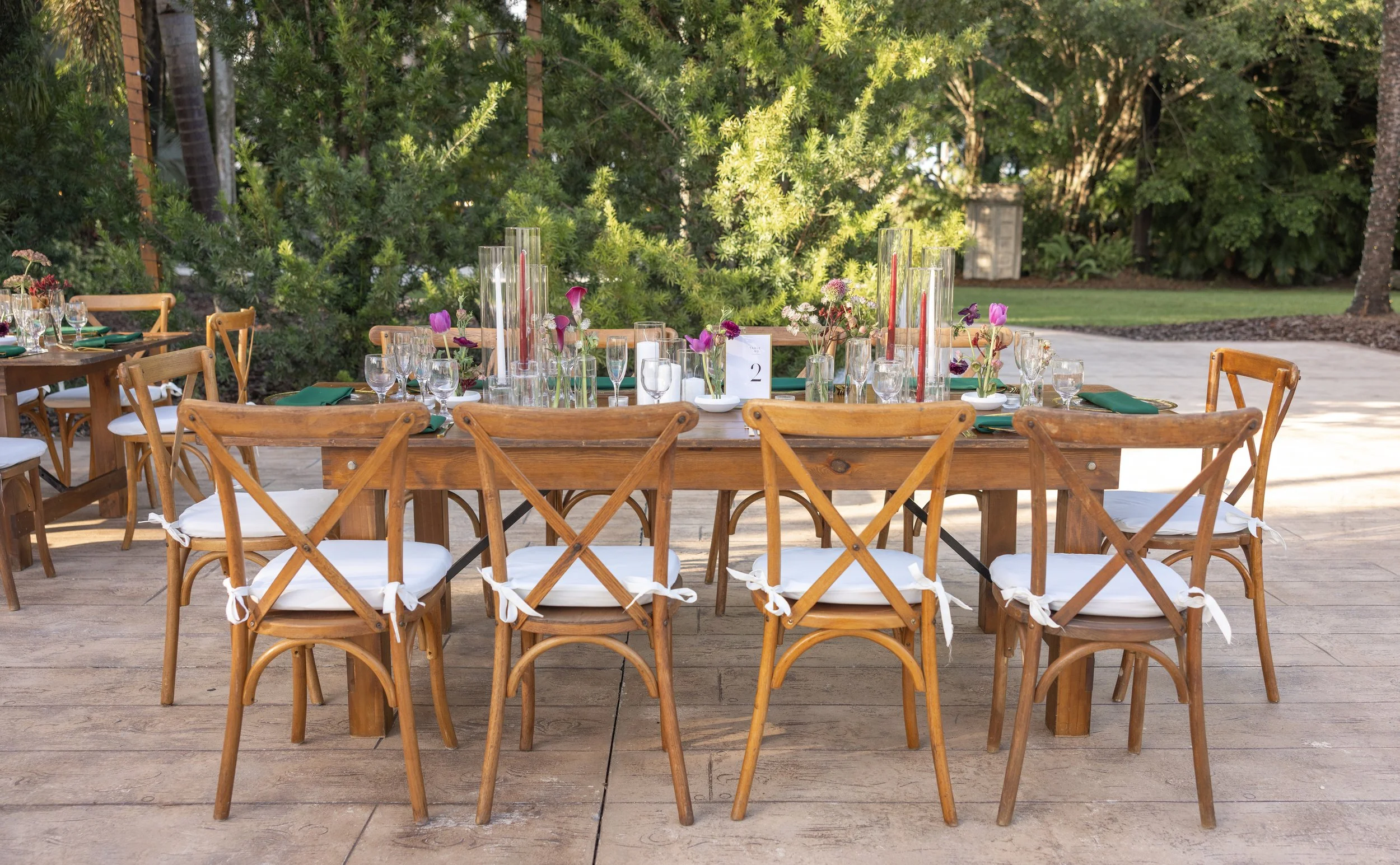 I'm looking for a florist in Miami that designs romantic and delicate floral arrangements for weddings. 