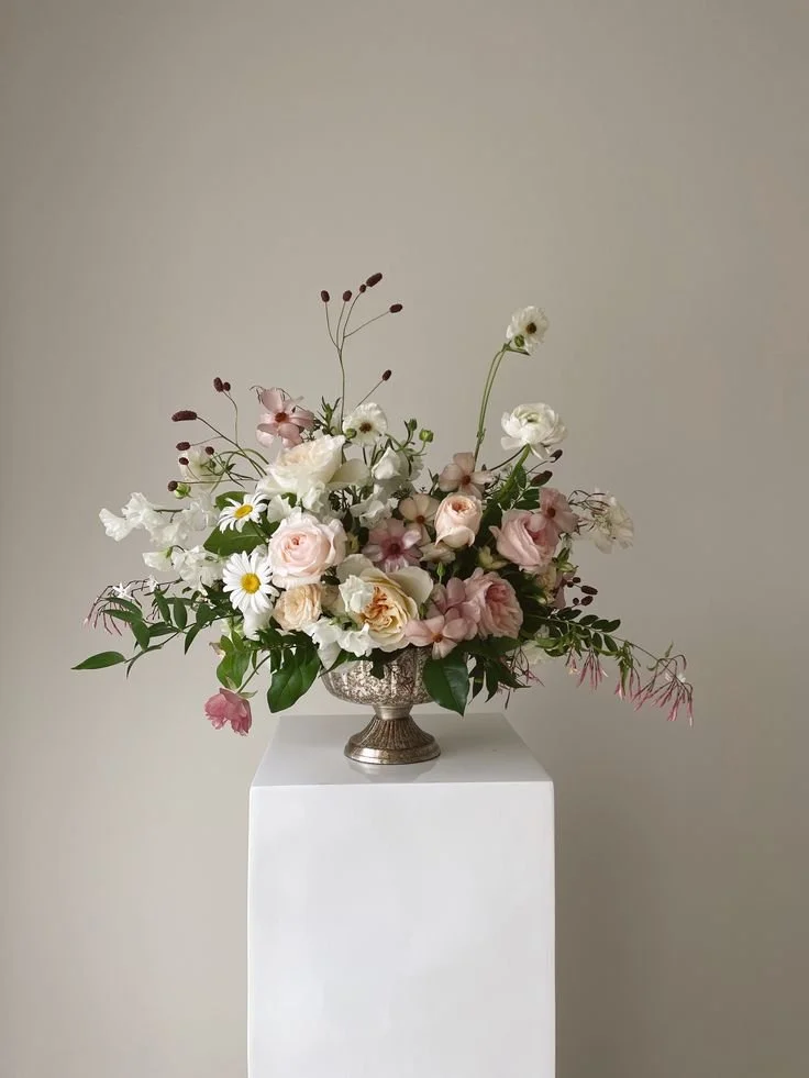 White and blush floral arrangement.jpg