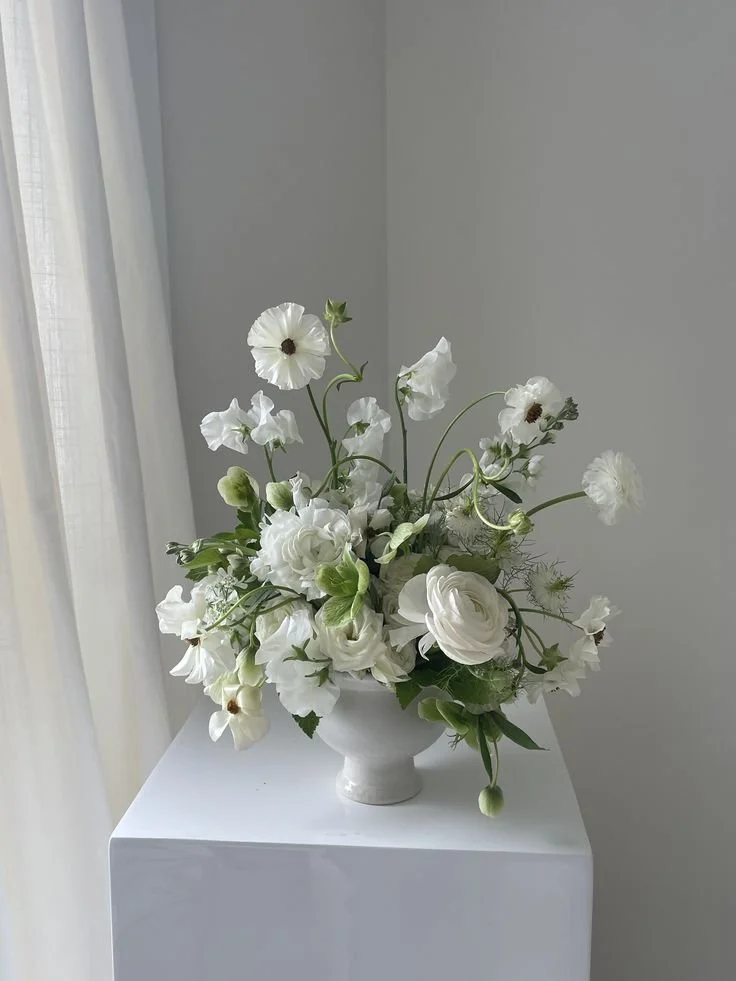 Petite, minimal white and green arrangement.jpg