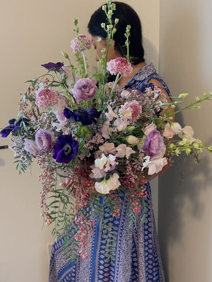 Whimsical lavender floral arrangement.jpg