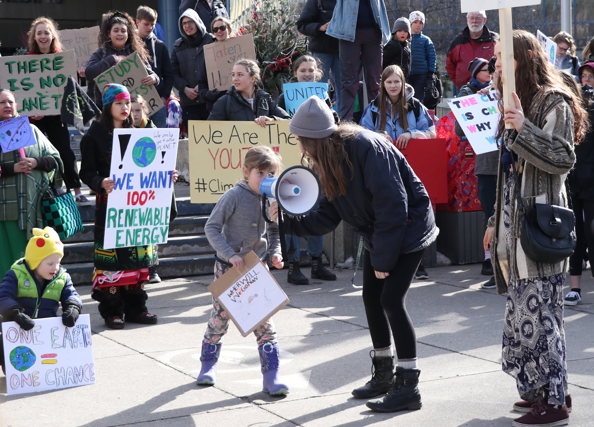  Protesters gather in front of City Hall in Calgary on Friday, March 15, 2019 for the Youth Strike for Climate. The majority of the protesters were junior high and high school students with a few younger students mixed in. Post secondary students and