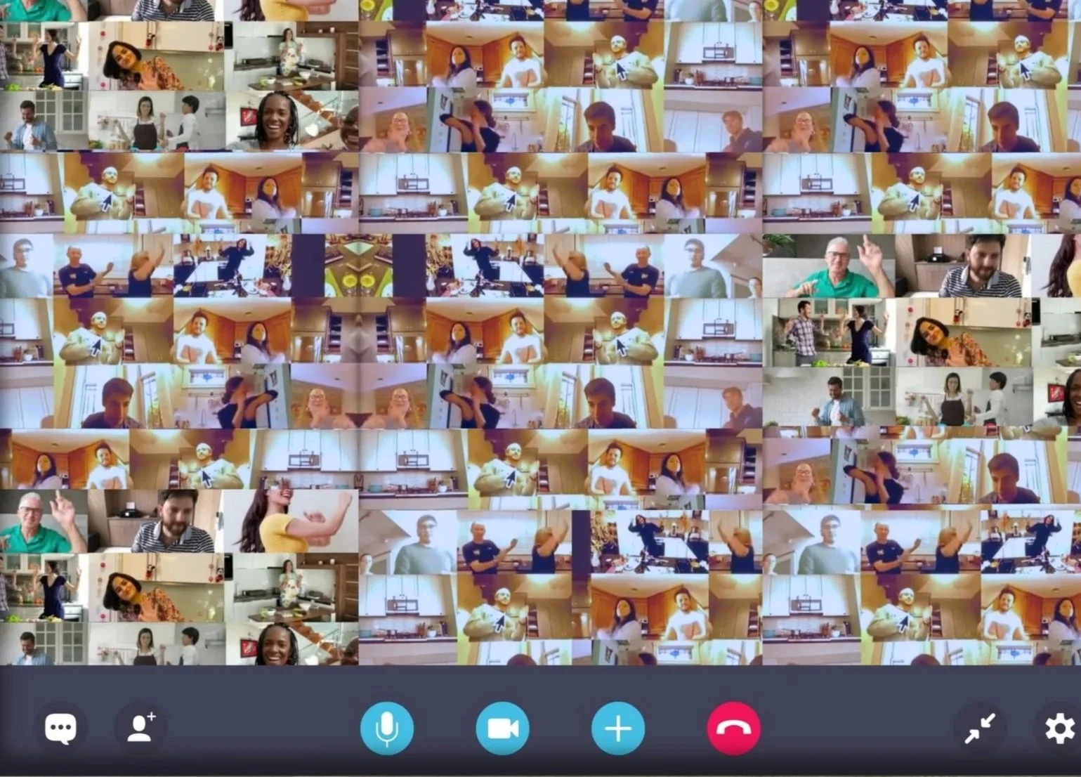 Video call grid of a large remote team cooking together in a virtual Indian cooking class with the Dancing Chef