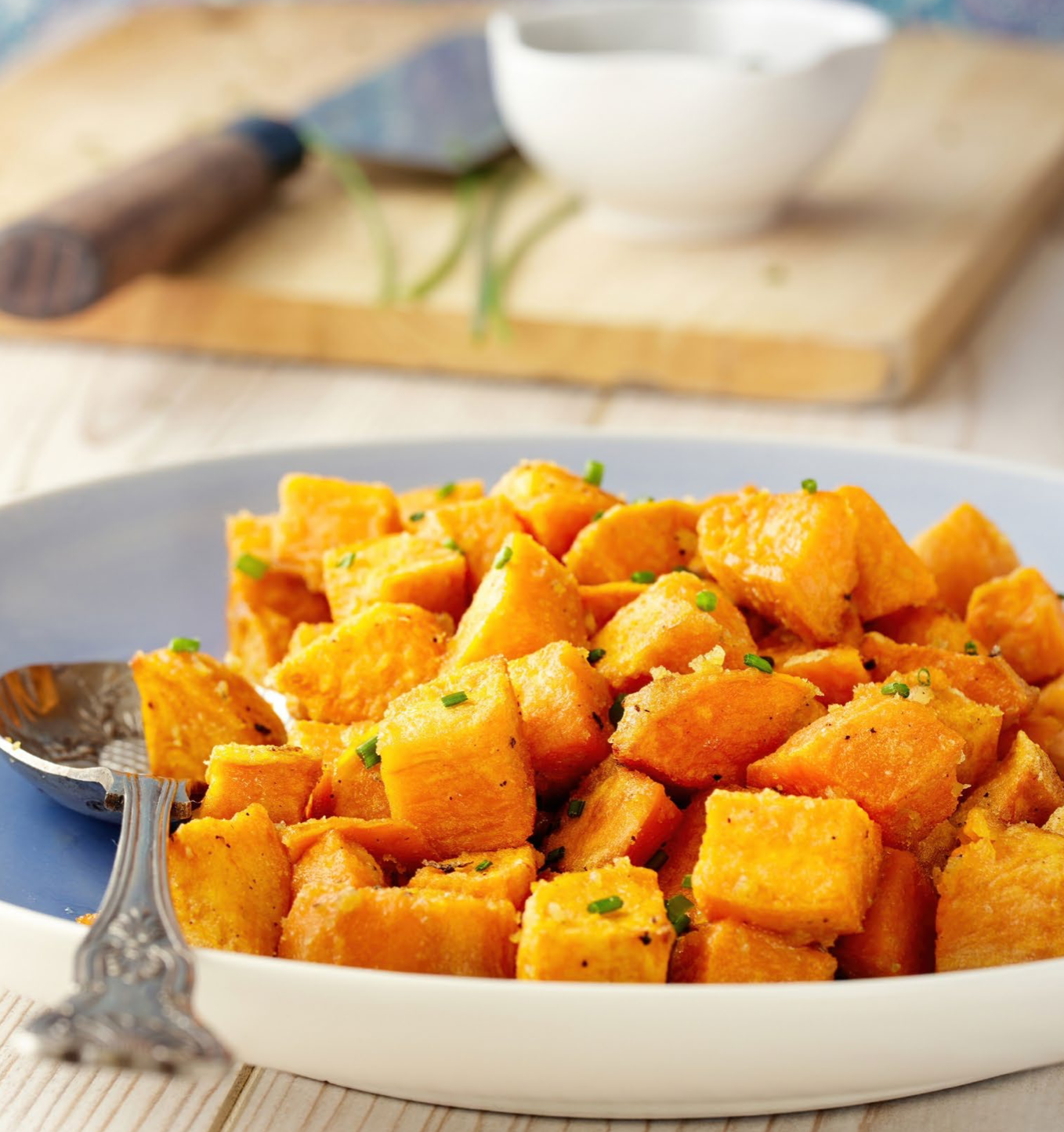 CHEESY ROASTED SWEET POTATOES