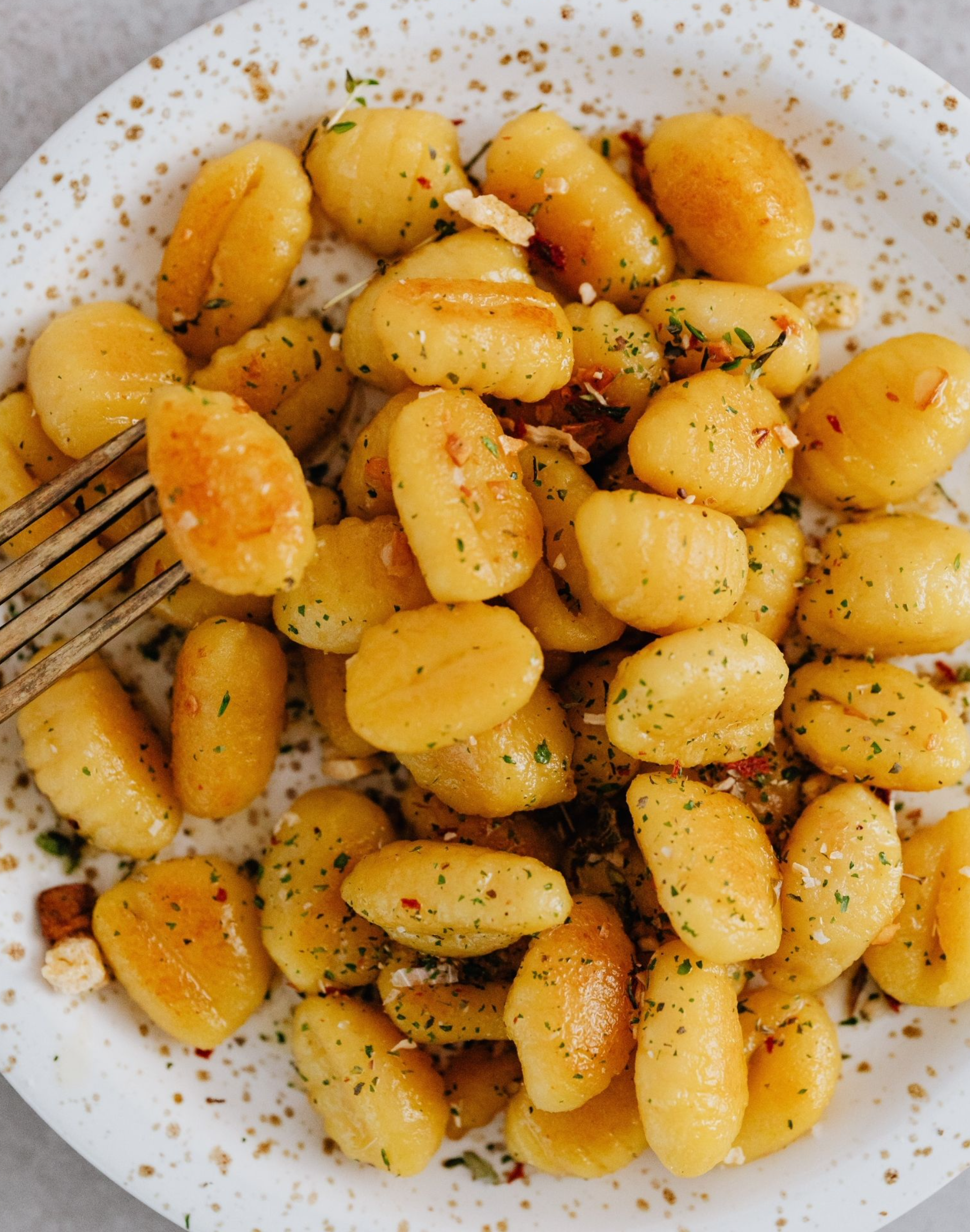POTATO GNOCCHI IN HERB-GARLIC SAUCE