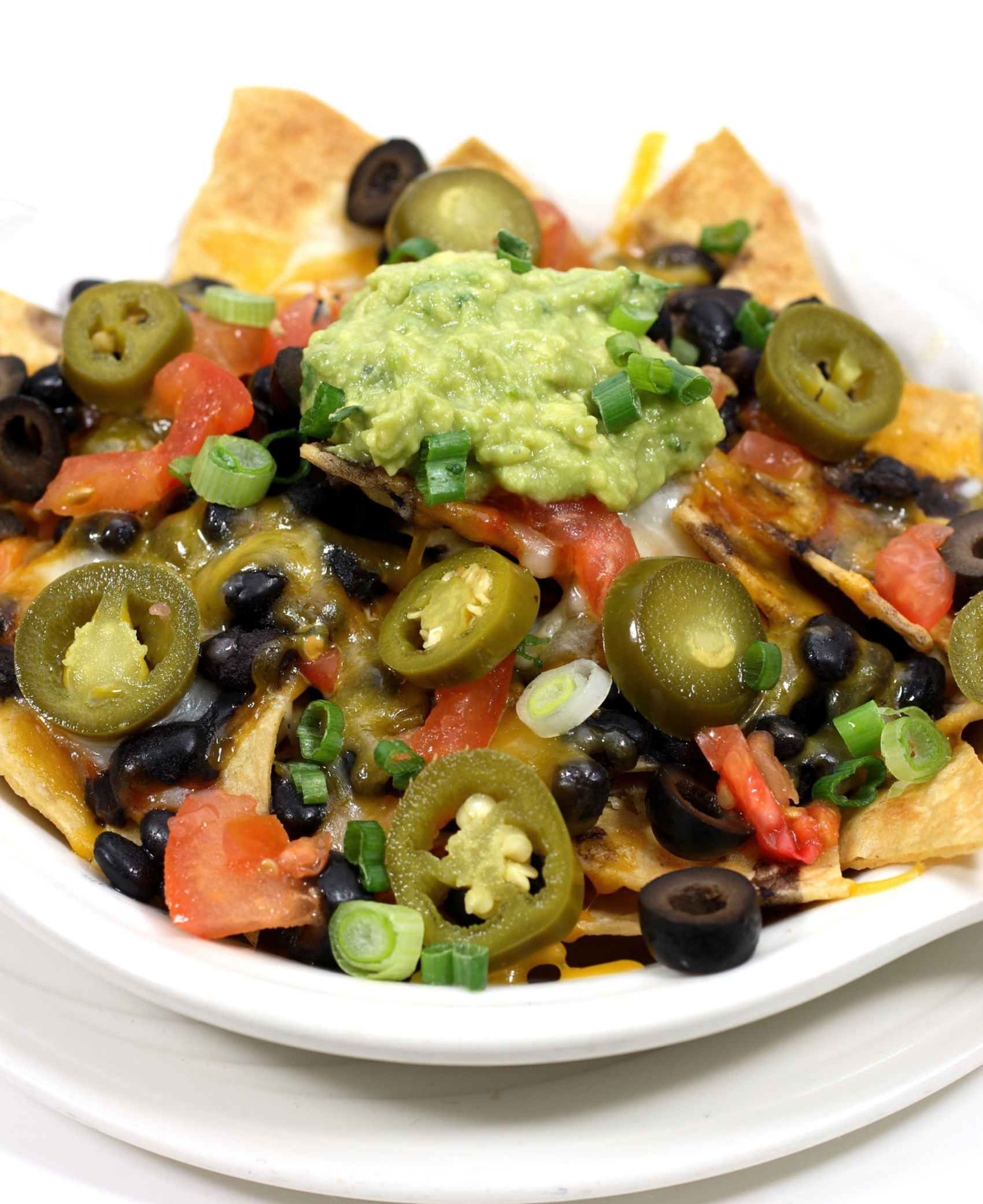 BLACK BEAN TEMPEH NACHOS WITH CASHEW CHEESE