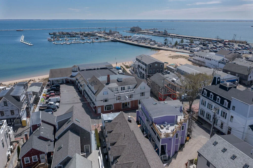 Drone shot of back of Building showing deck and Harbor 01.jpg