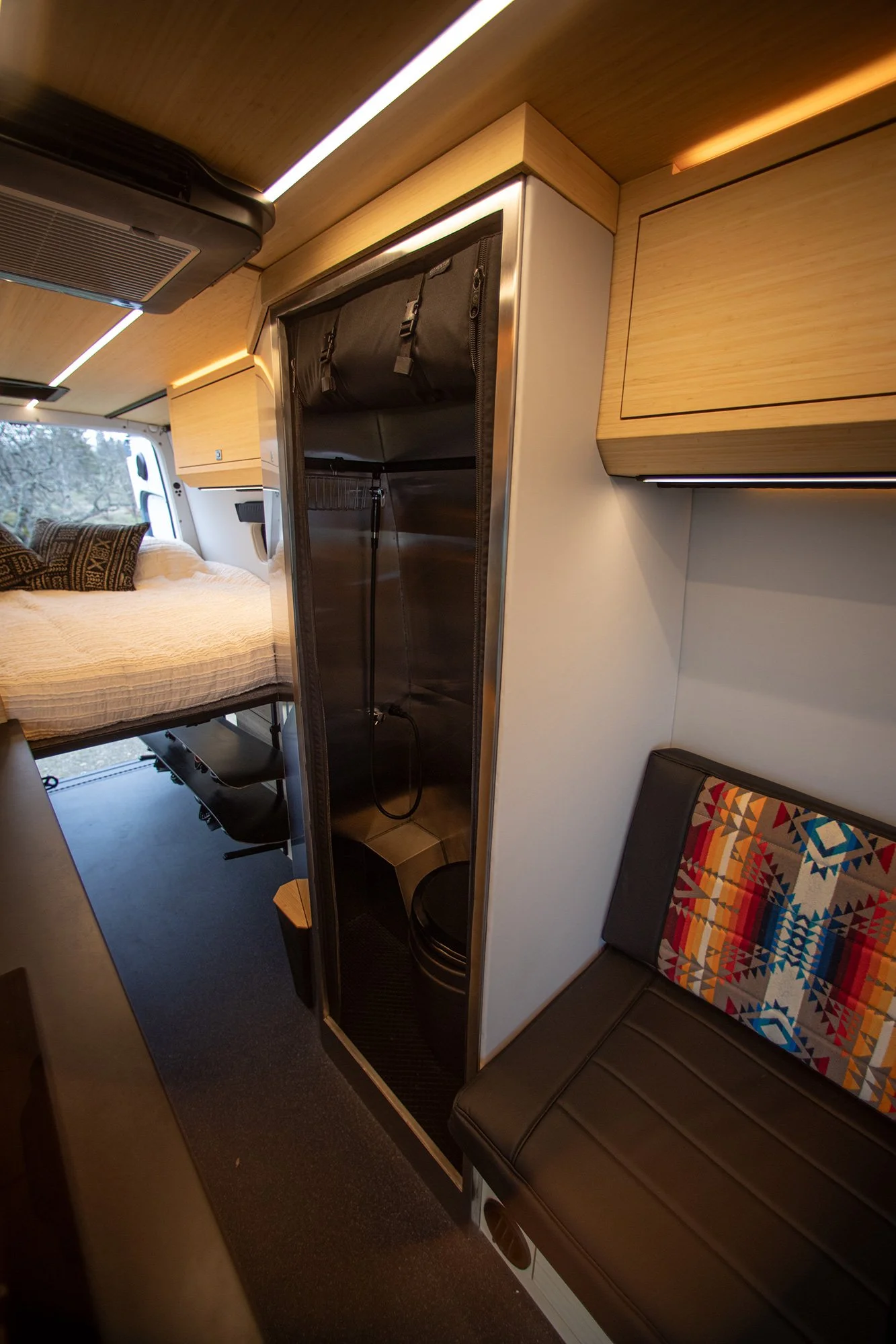 EAV Zephyr Adventure Van's toilet and shower area.