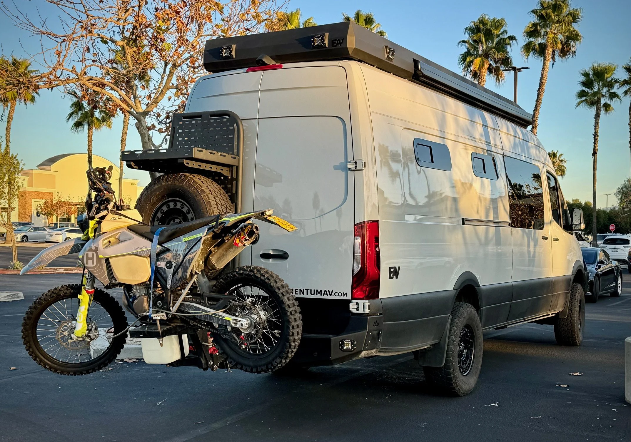 EAV Wolf Adventure Van hauling a dirt bike