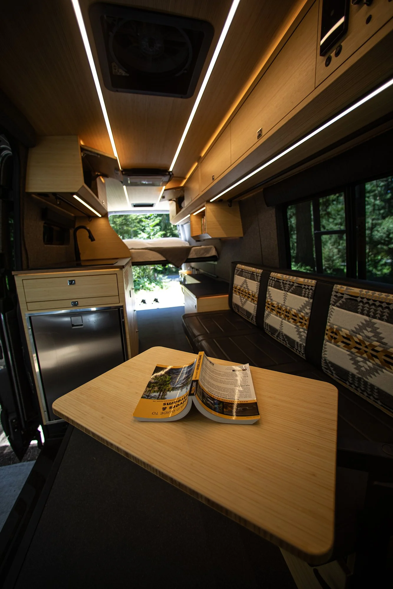 Earl Gray adventure van interior looking toward the back of the van.