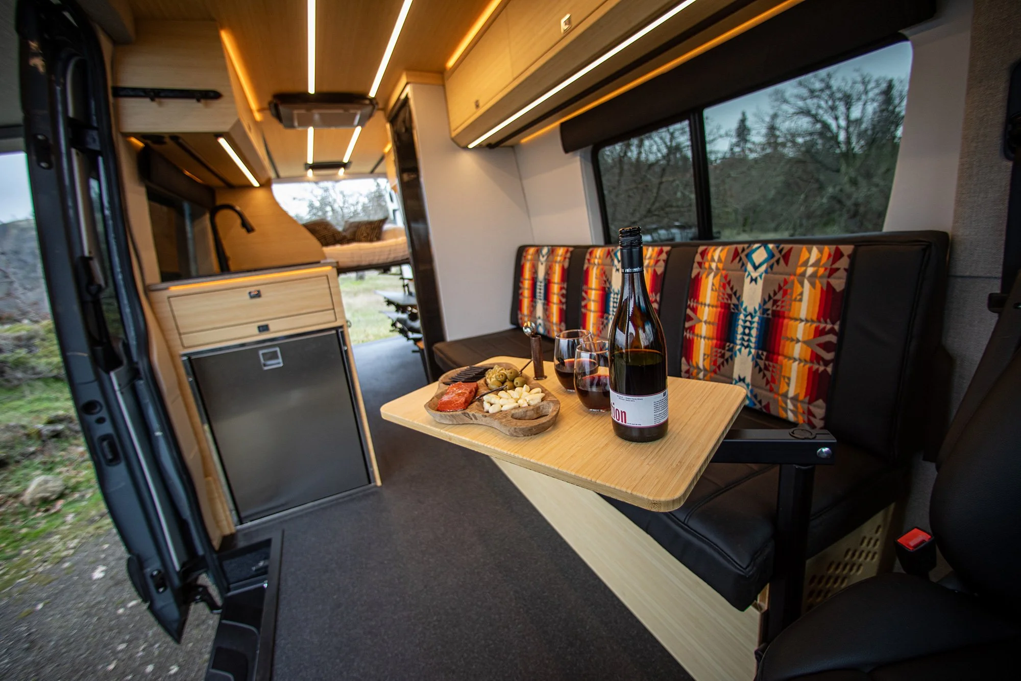 EAV Zephyr Interior with a charcuterie board setup