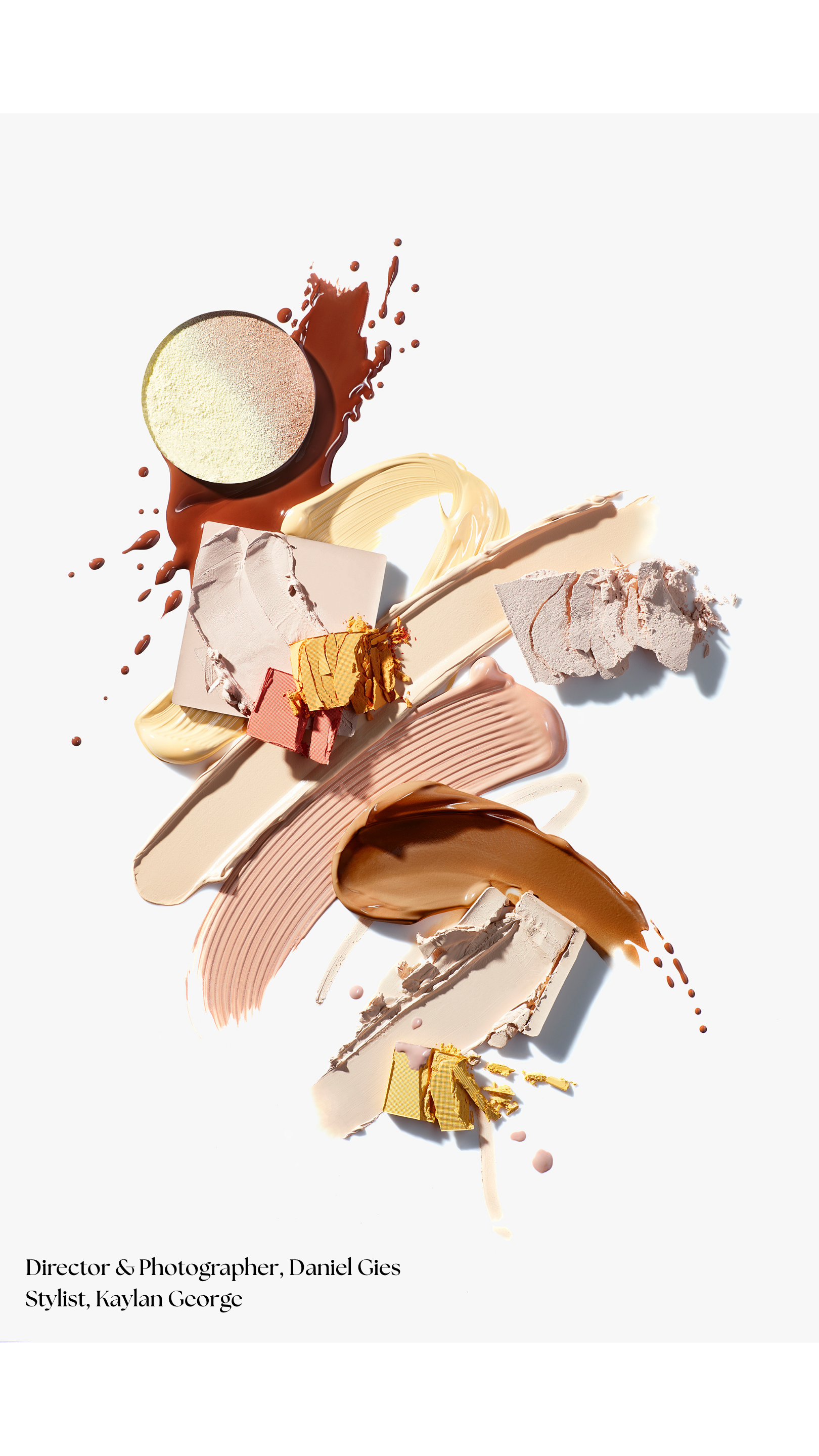 Various swatches of makeup and foundation products arranged artistically on a white background.