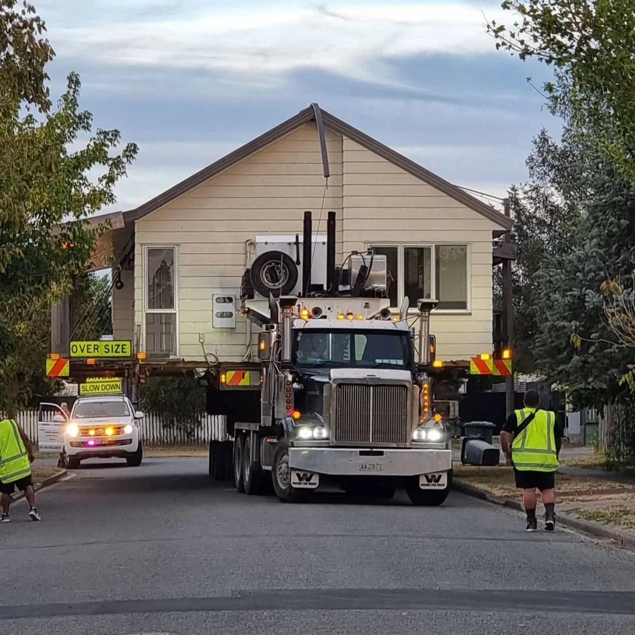 relocatable home being transported on the road
