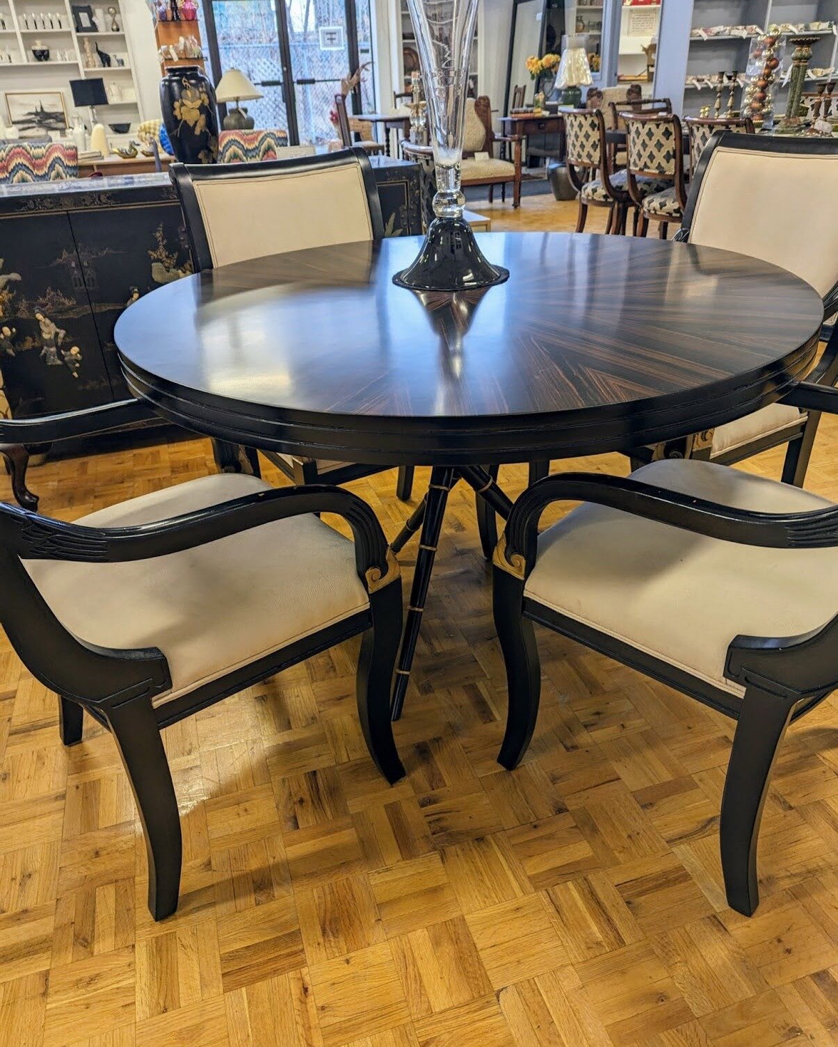 Elevate your dining moments with a touch of timeless grace. 

This wooden dining table, with its sleek lines and rich wood finish, harmonizes perfectly with the classic elegance of these beige upholstered armchairs. ✨ This ensemble is more than a mer