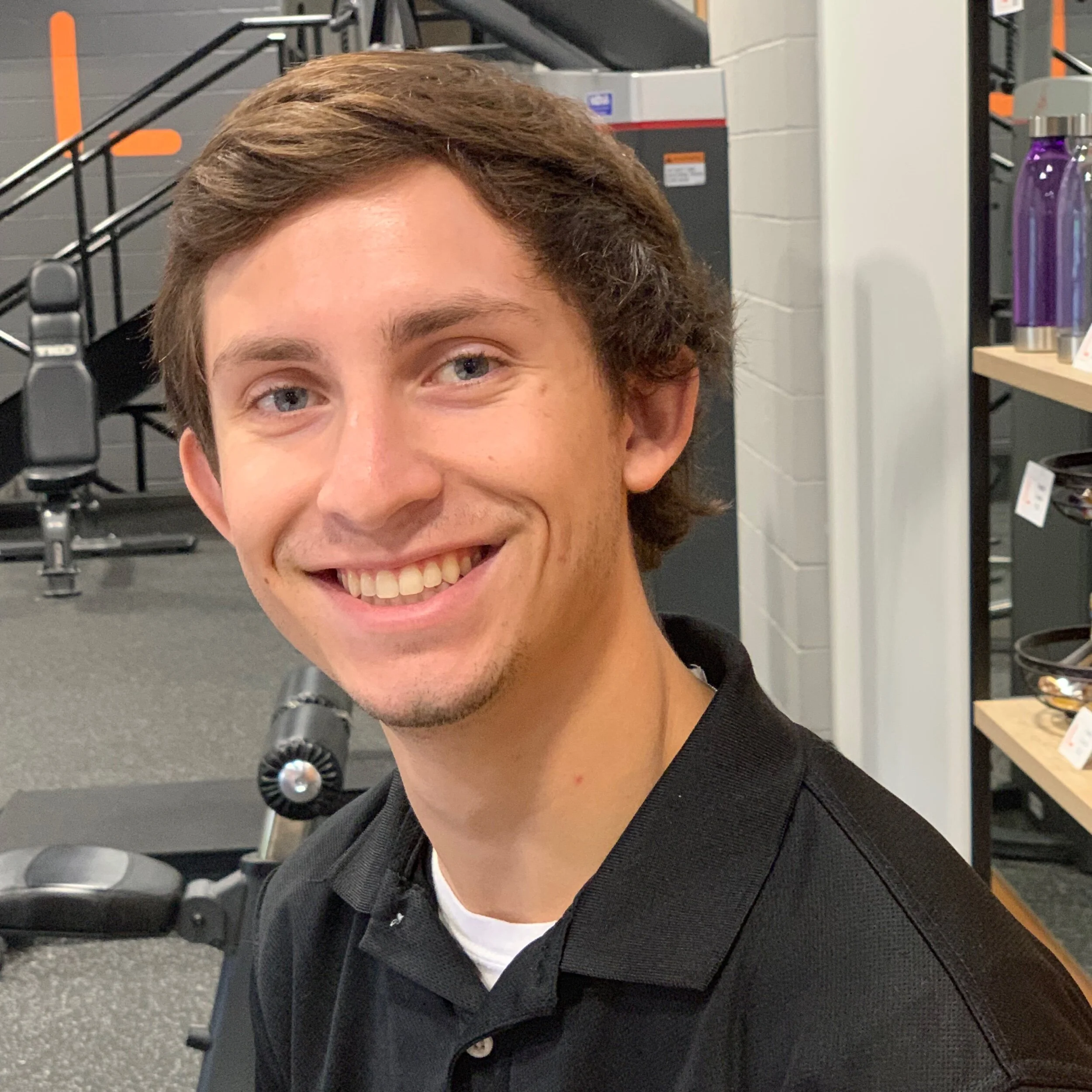 Sam Sam is our Engagement Coach. You’ll see his smiling face around the club, ready to answer your questions and share his passion for fitness. Sam’s crazy schedule has him juggling, college, work, and his overall passion for sports – whether participating or as a fan. Sam ran track in high school and remains active. Sam’s favorite sports teams are the Duke Blue Devils in basketball and the Detroit Lions of the NFL -- which we didn’t hold against him, as Ken and Matt are Bears and Saints fans, respectively.