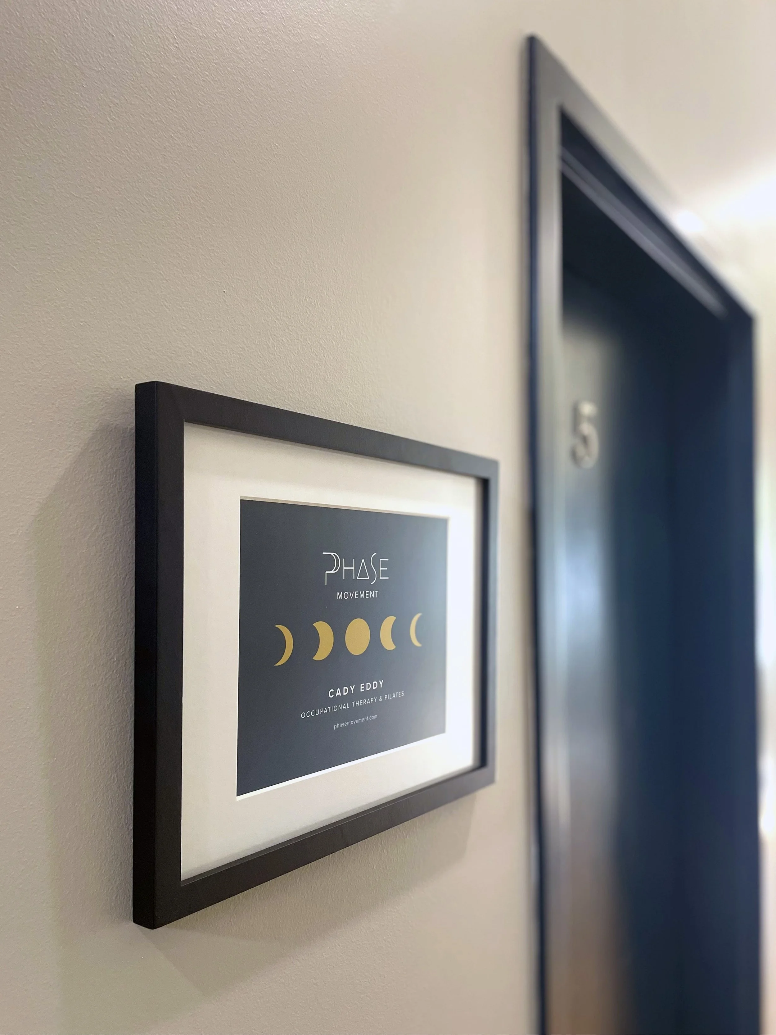 Image of Phase Movement's Studio Sign and Door in Minneapolis.