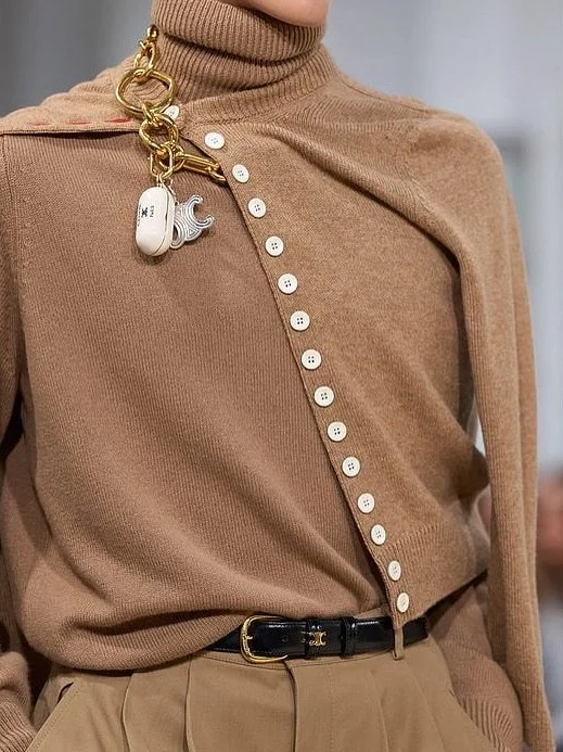 A cardigan doesn&rsquo;t have to be boring. 

This season I&rsquo;ve spotted so many creative ways to wear it:

 &bull; Asymmetrically buttoned over another layer
 
&bull; Draped and fastened at the shoulders like a scarf

 &bull; Worn open with anot