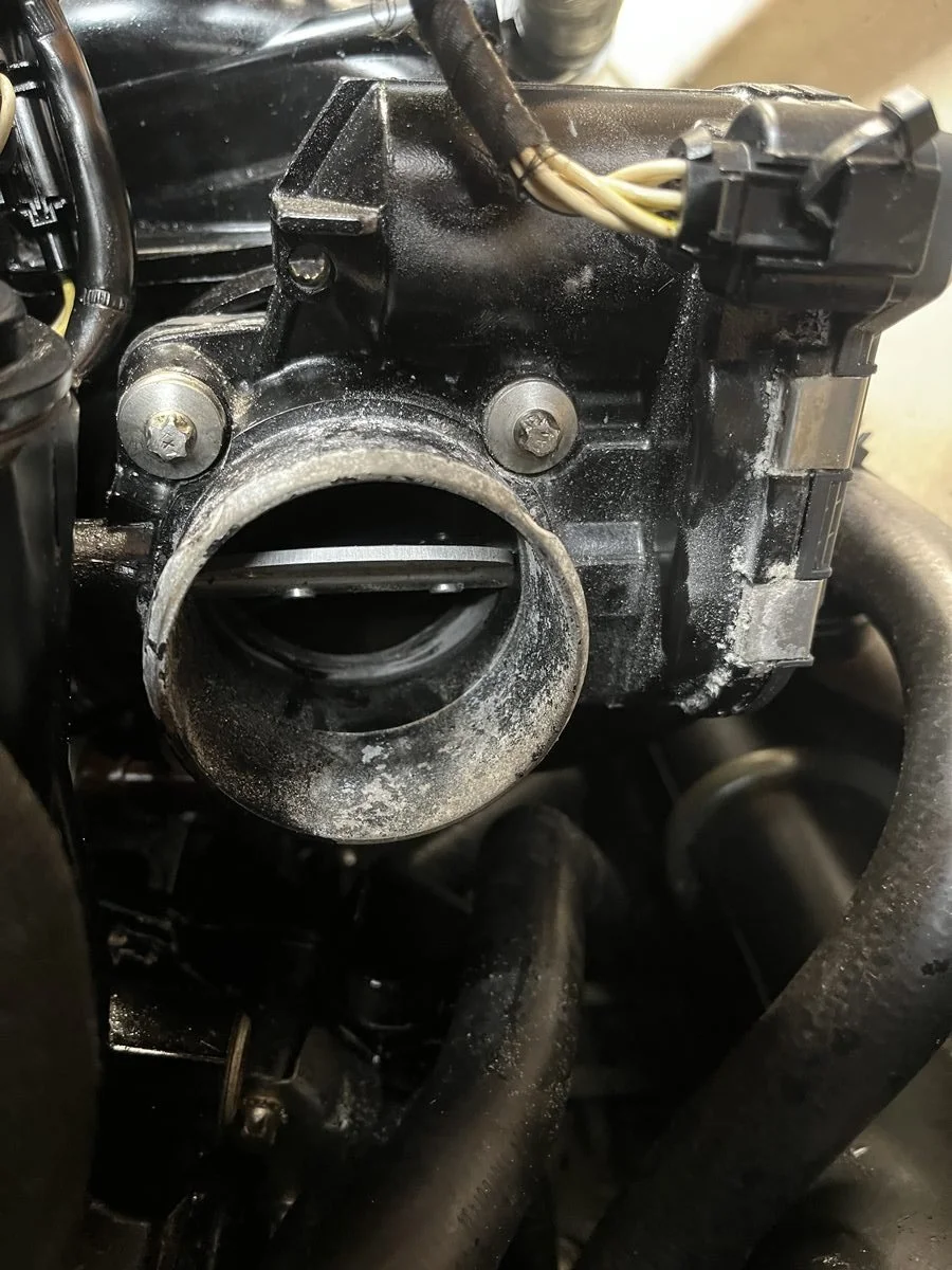 Sea-Doo throttle body showing the butterfly valve — sticking here is the most common cause of throttle actuator fault codes
