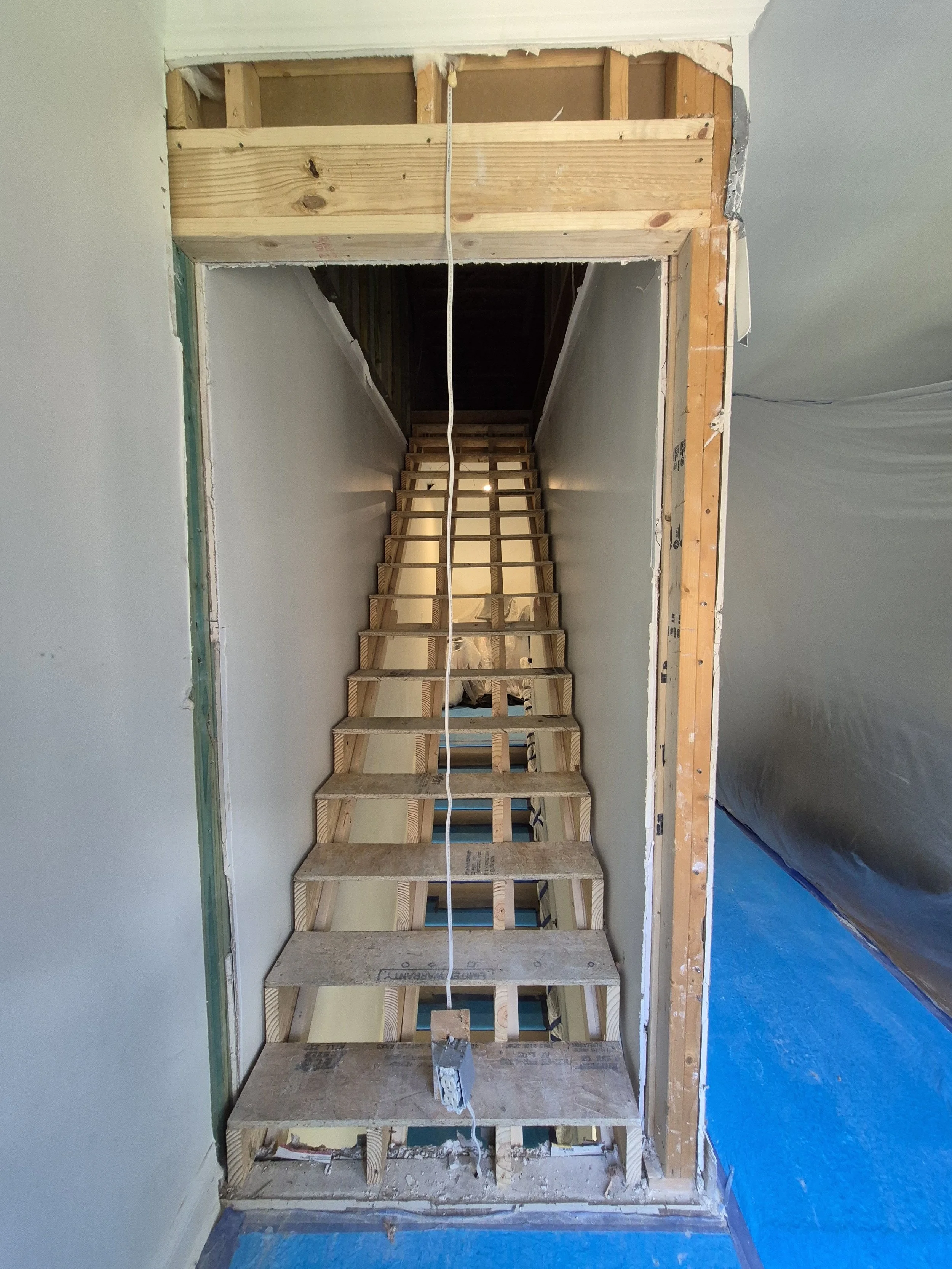 Stairs to the attic in preperation for the hatch