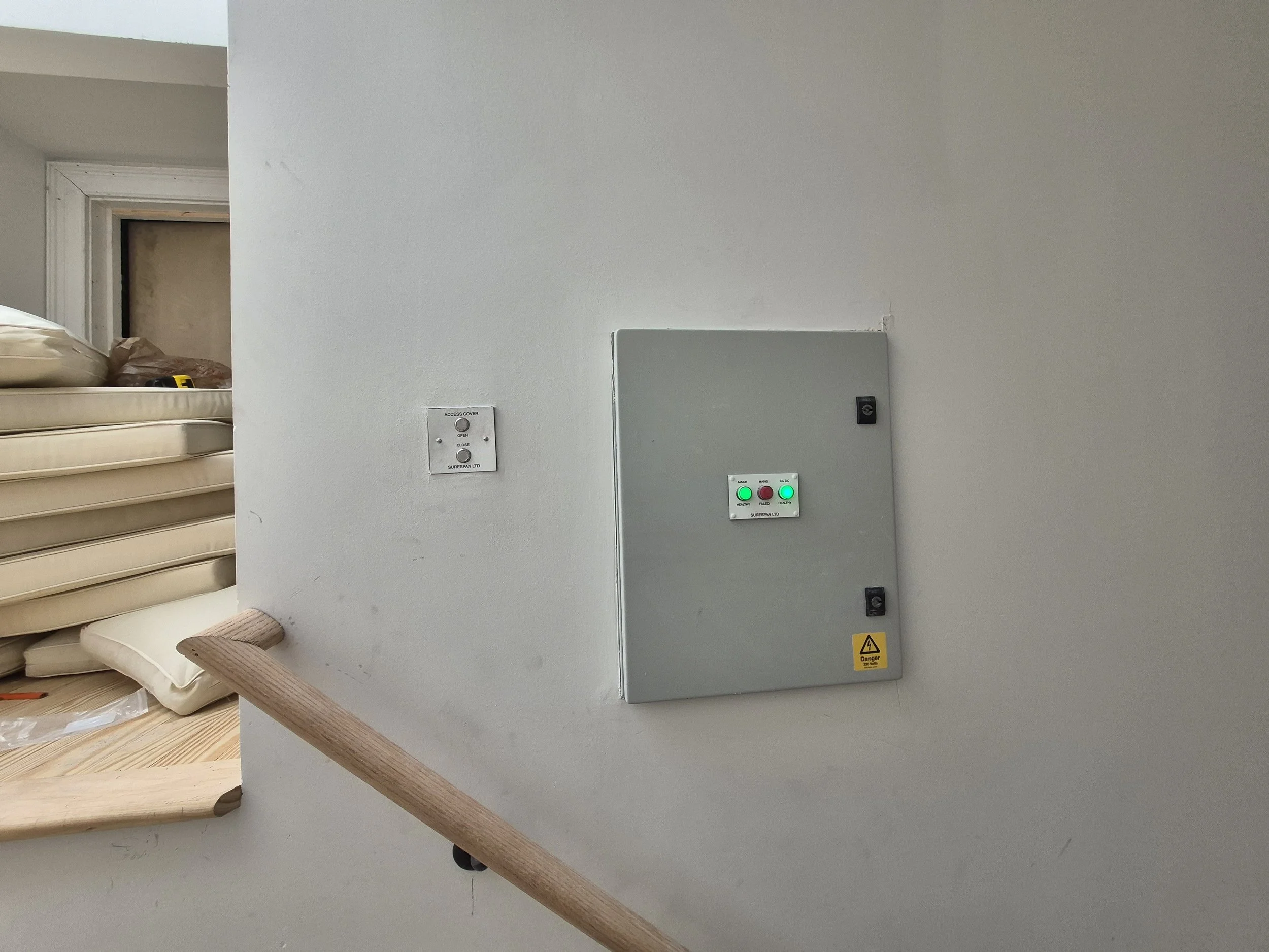The hatch controls and panel set into the wall