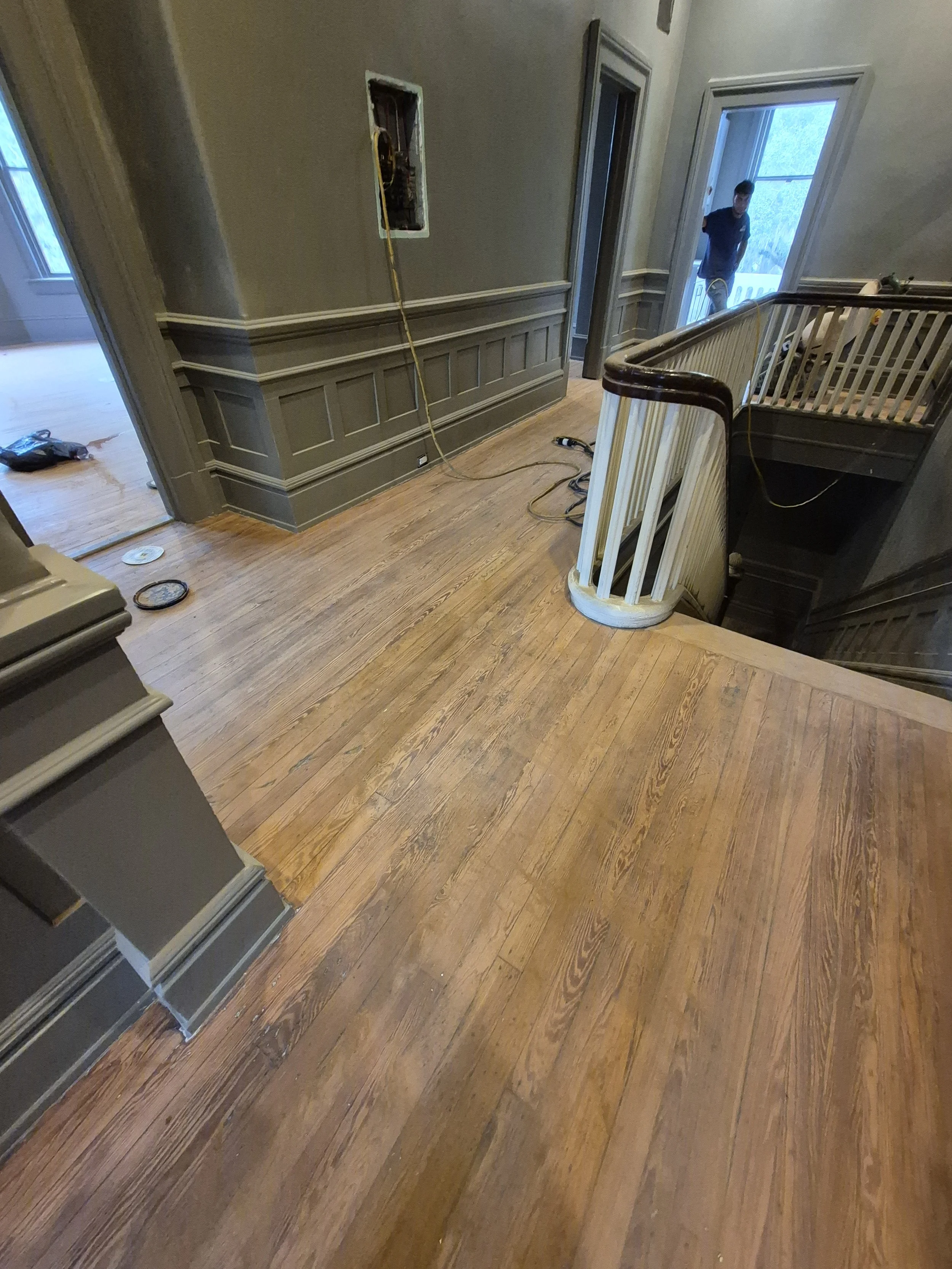 Sanding and refinishing the original flooring