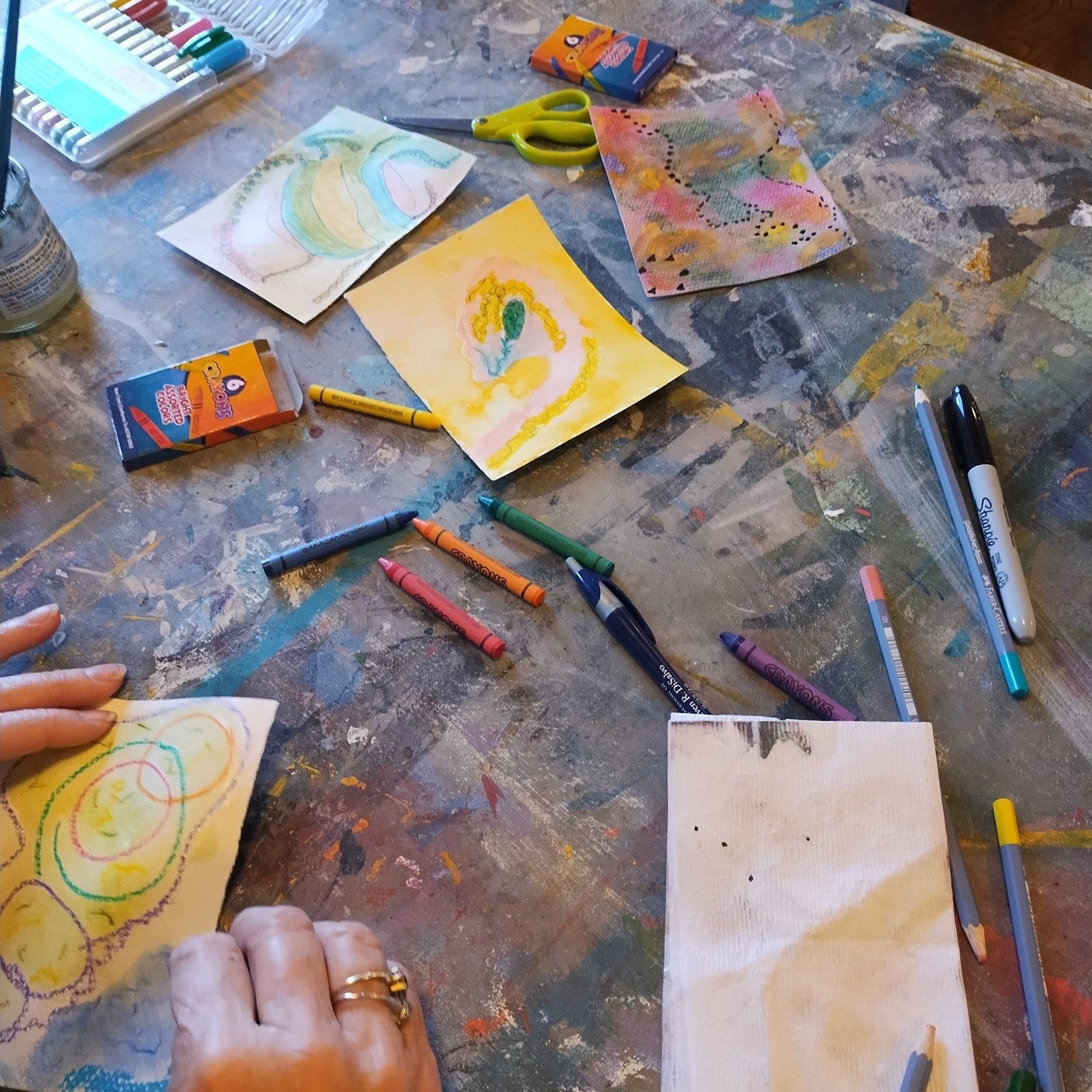 Another creative and fun class with instructor Jude leading the Creative Art Series for Seniors.

We doodled in black ink then filled in areas with water color pencils. We pulled out watercolor palettes, crayons and pastels, and the group creatively 