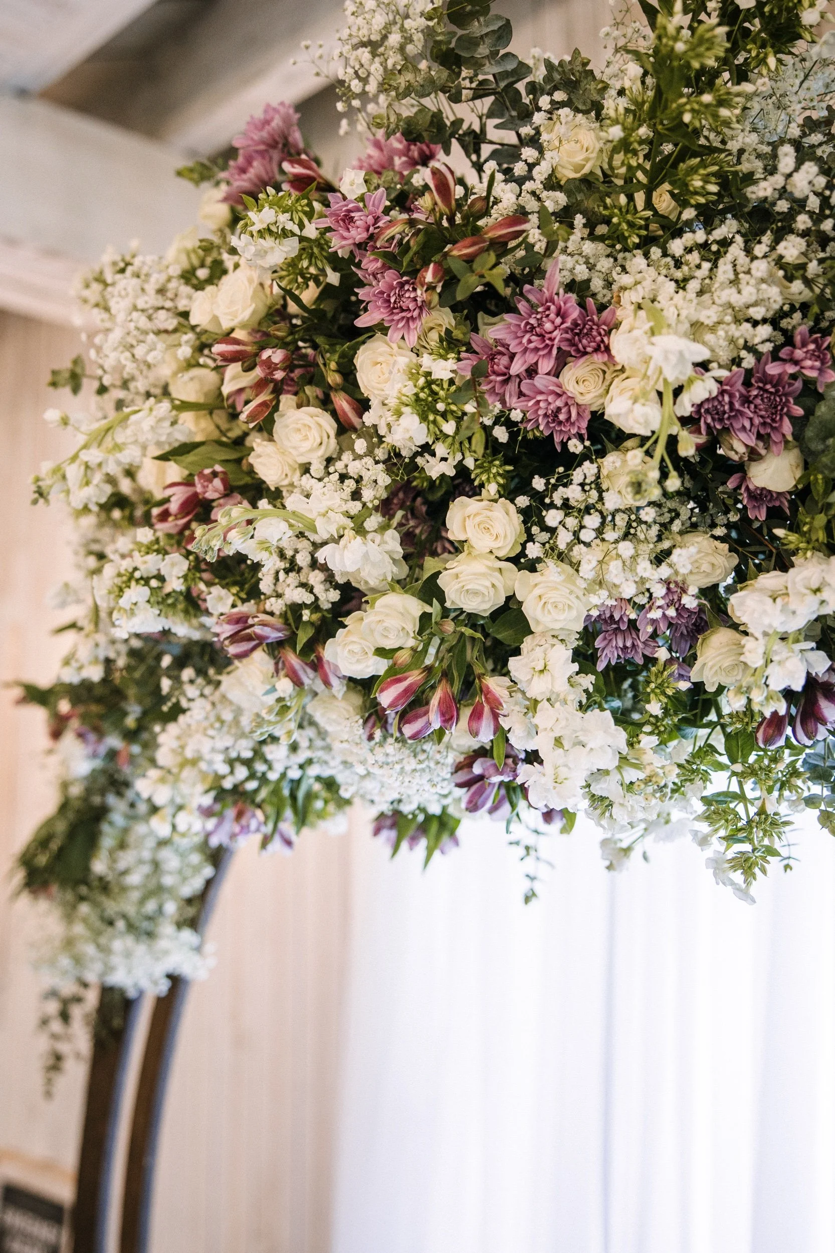 Lavender and white wedding arch