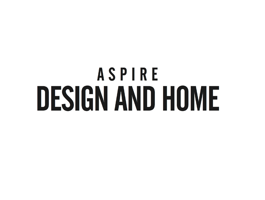 Bold black text on a white background that reads "Aspire Design and Home."