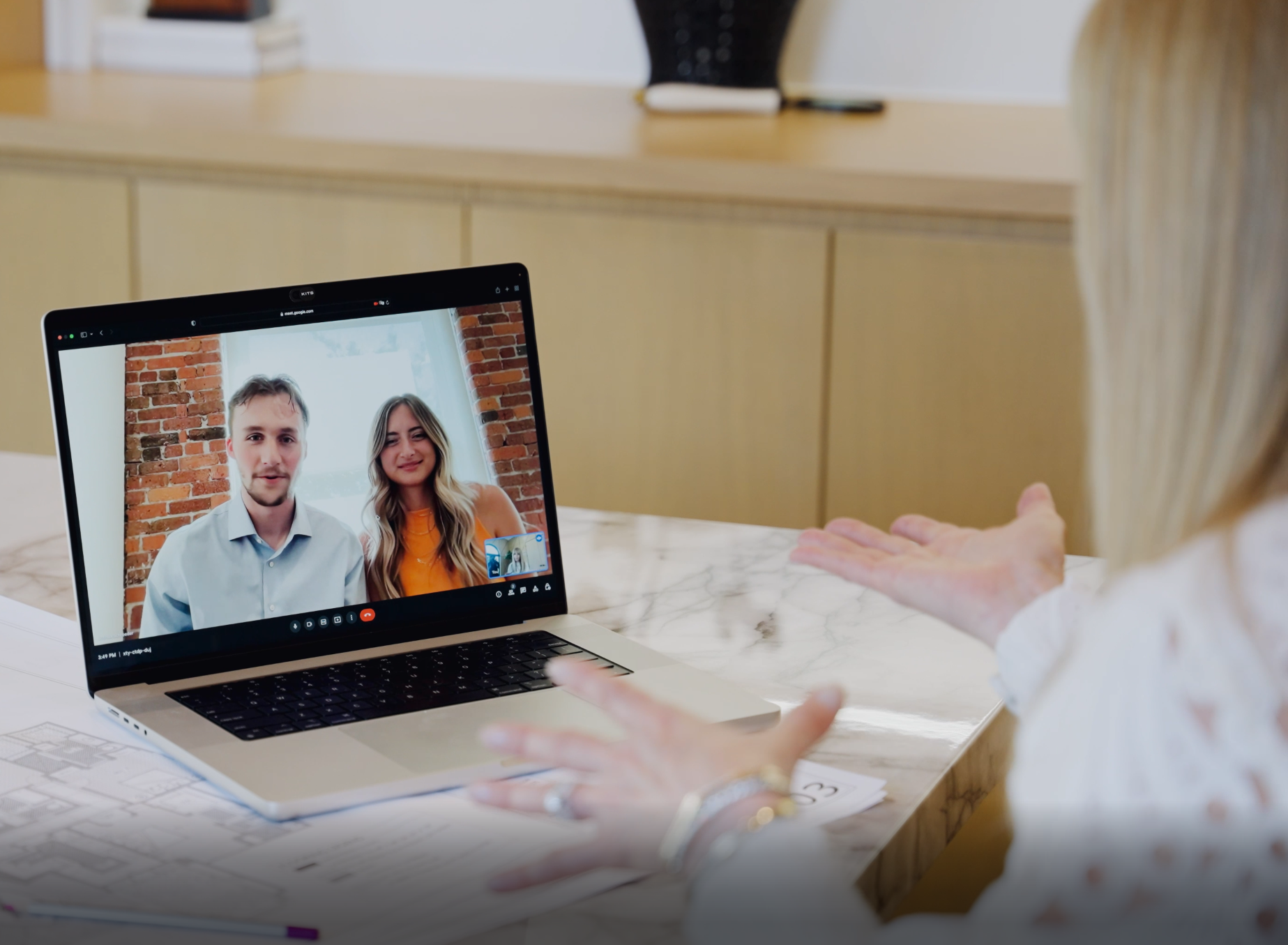 Virtual interior design consultation with LUXYSPACE on a laptop video call