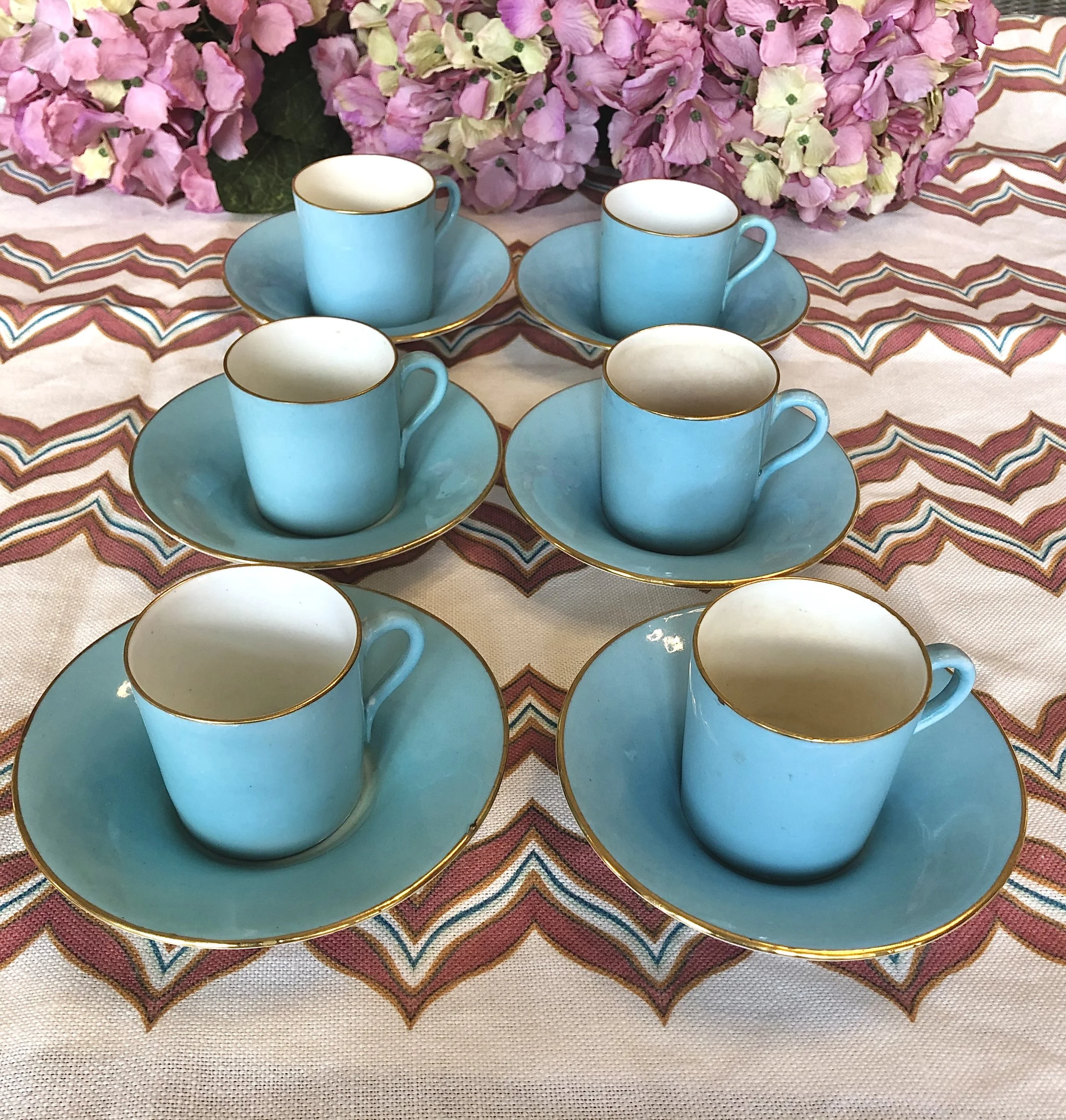 80. Vintage turquoise coffee cans and saucers
