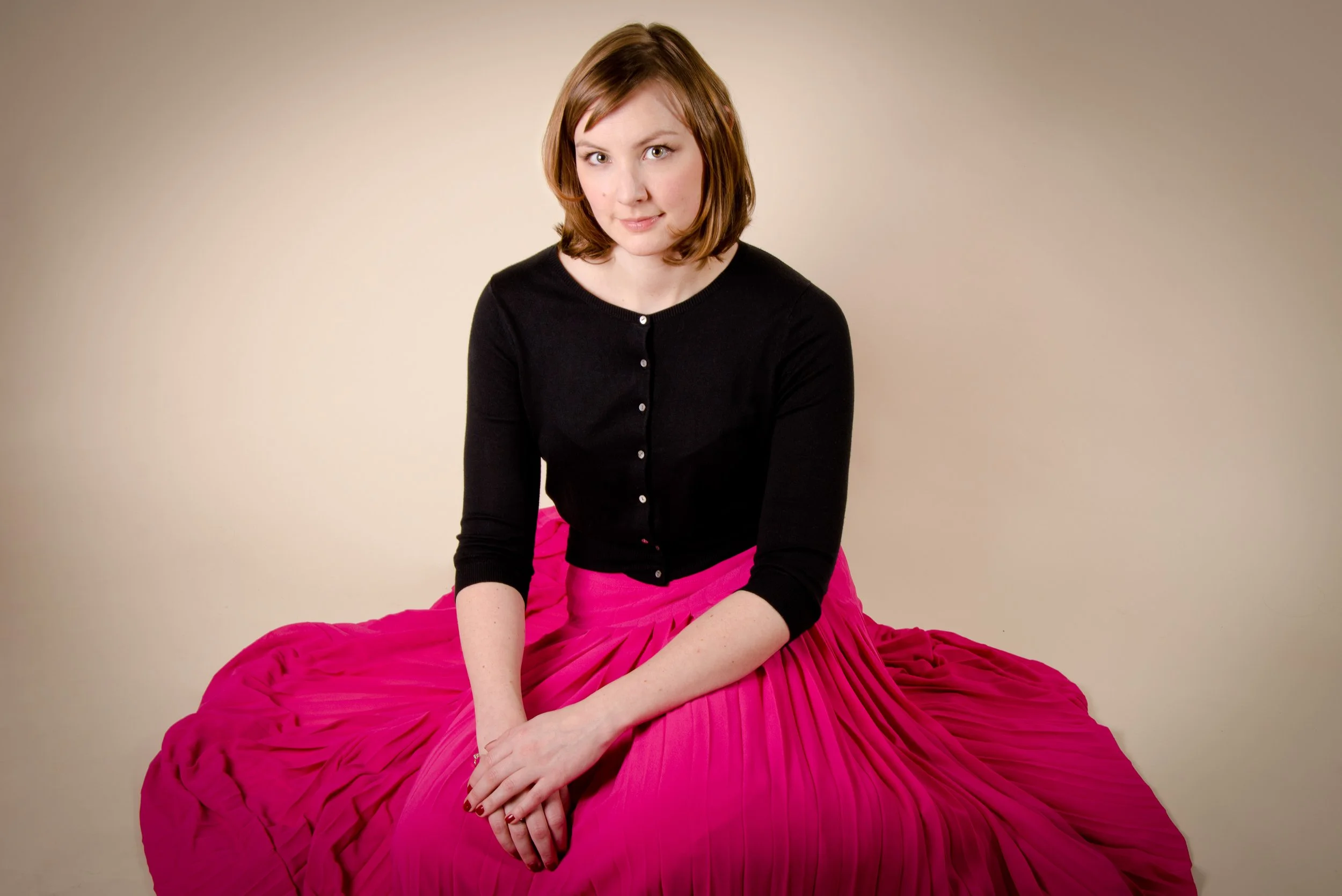 Harriet.web-5 pink skirt sitting.jpg