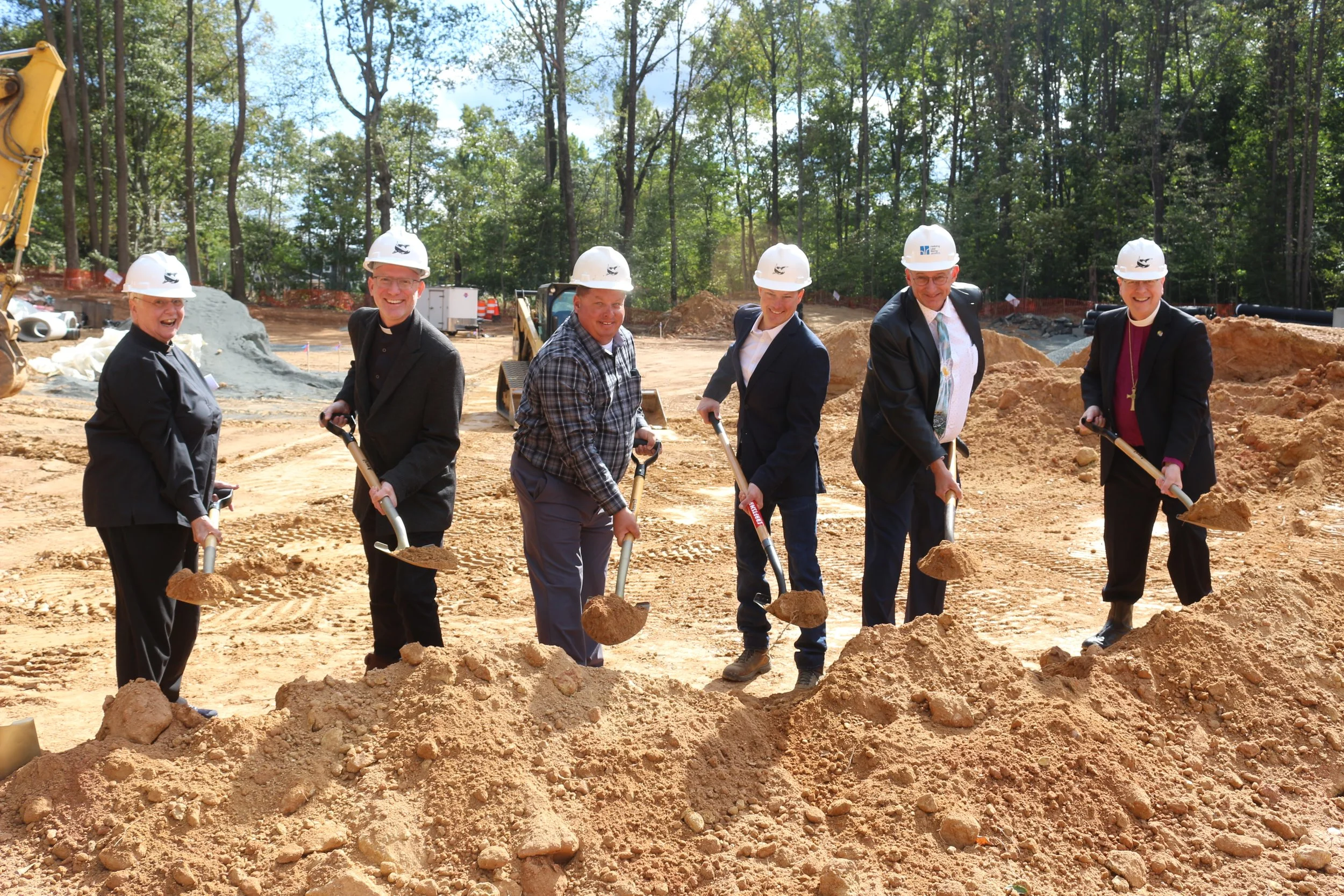  Deacon Sallie; Fr. Travis; Jeff Zavalanski—Field Superintendent; Tom Nicholson—Owner and Project Manager, Hammerhead Construction Company; John Recny—Owner of Helbing, Lipp, Recny Architects; and Bp. John 