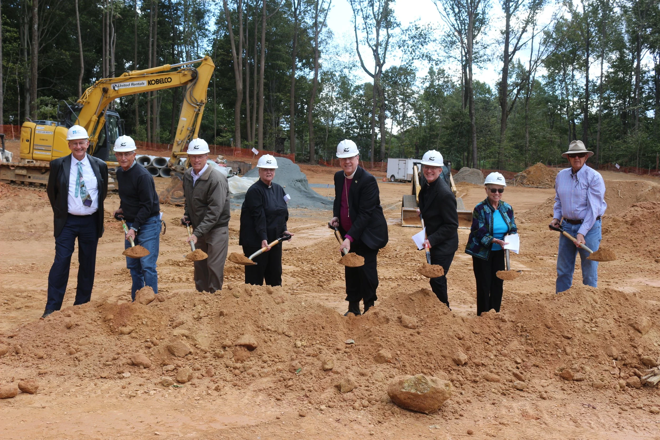  John Recny-Architect; Phil Westcott—Jr. Warden; Bob Mann—Move Team Co-chair; Rev. Sallie Rathbone--Immanuel’s Deacon; Bp. John, Fr. Travis Hines—Immanuel’s Rector; Chloellen Miller—Move Team Co-chair; and Alan Clark—Sr. Warden 