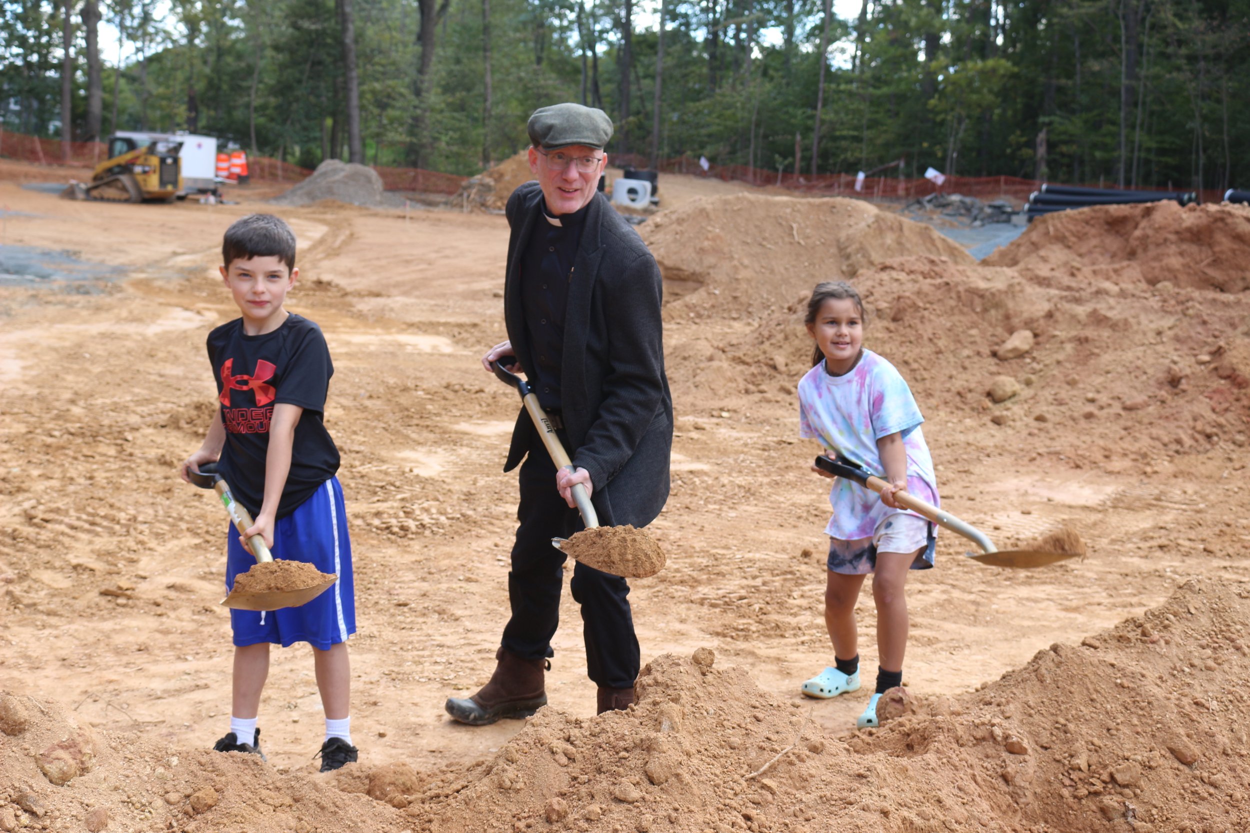  Fr. Travis with Owen and Bella representing Sunday School. 