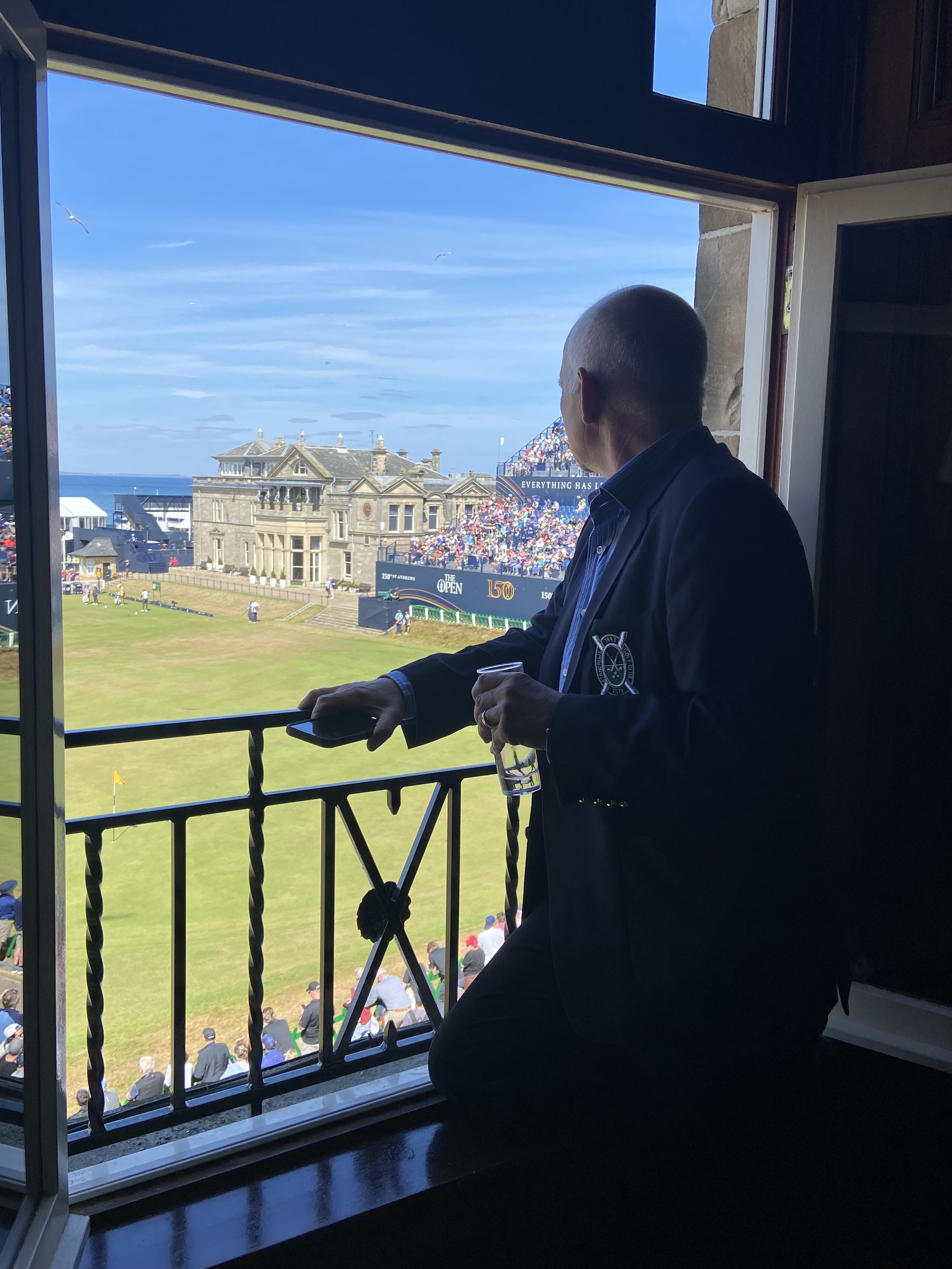 Alan looking out window at 18th of The Old Course  150th open.jpg